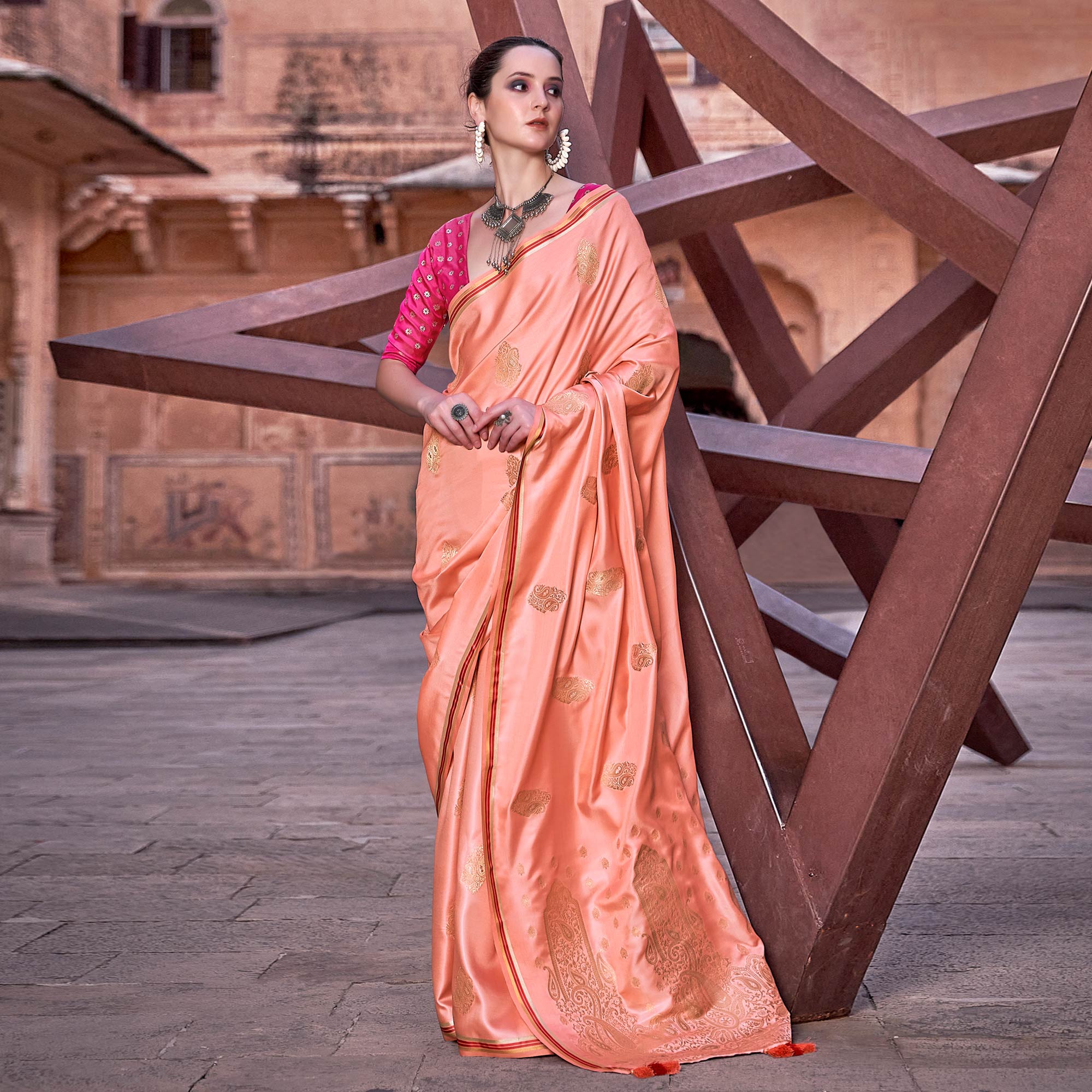 Peach Woven Satin Saree With Tassels