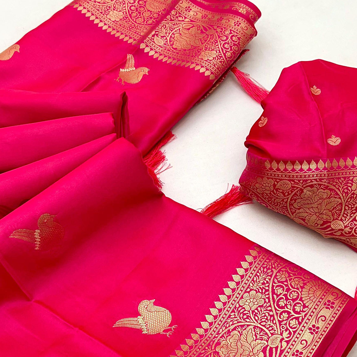Pink Satin Silk Saree With Zari Woven Bird Motifs & Elegant Tassel Border