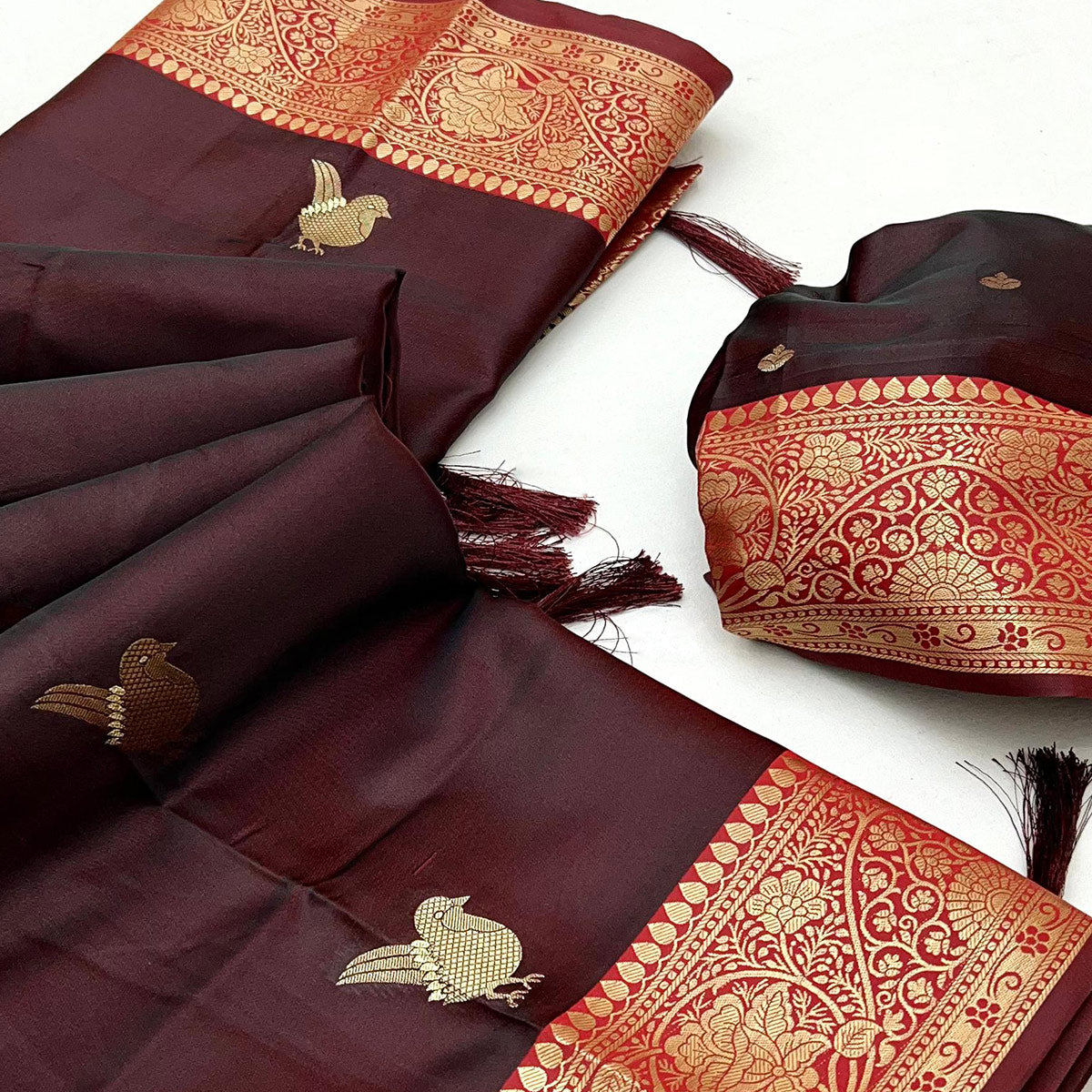Dark Maroon Satin Silk Saree With Zari Woven Bird Motifs & Elegant Tassel Border