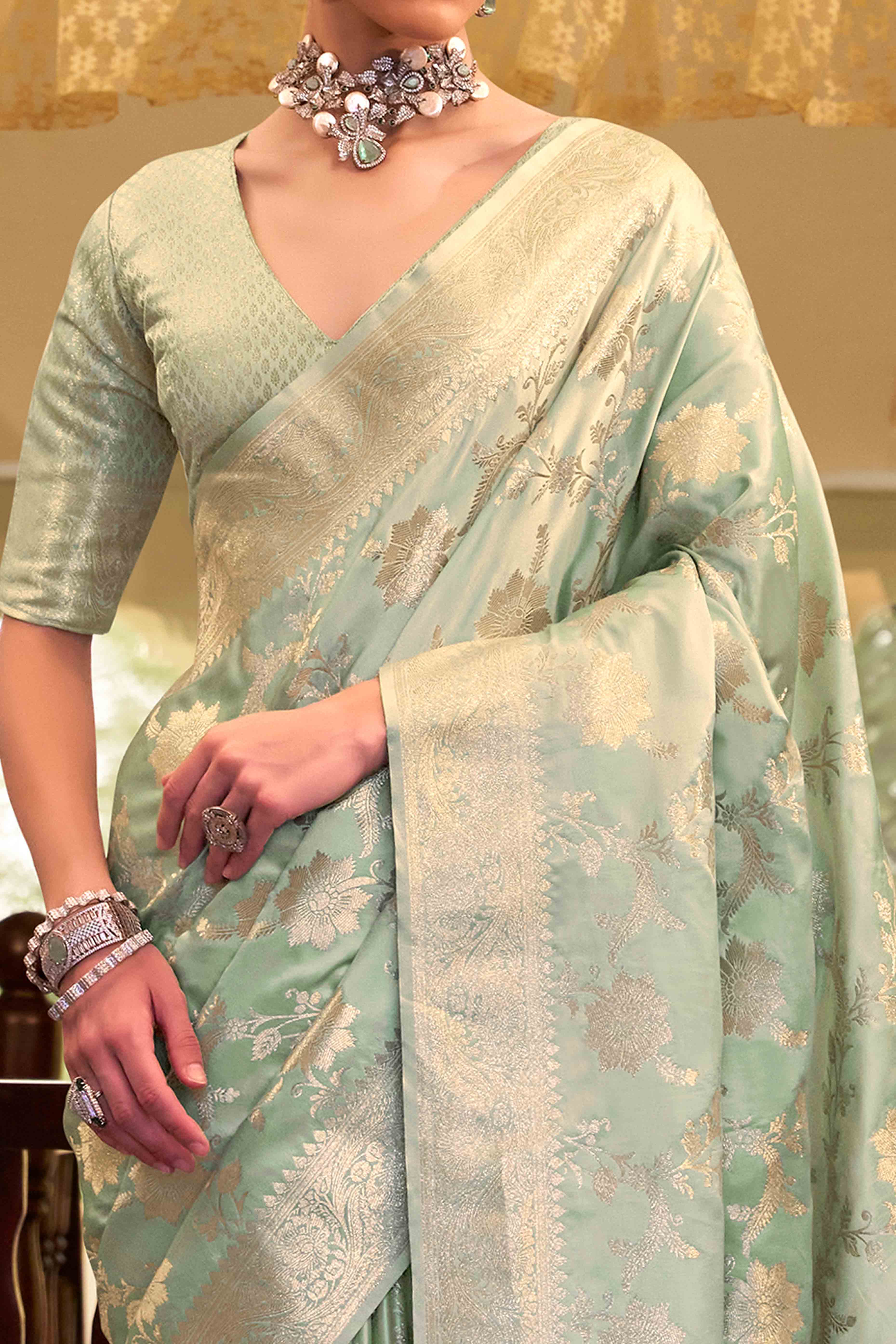 Sea Green Soft Satin Saree Featuring Exquisite Zari Weaving Work