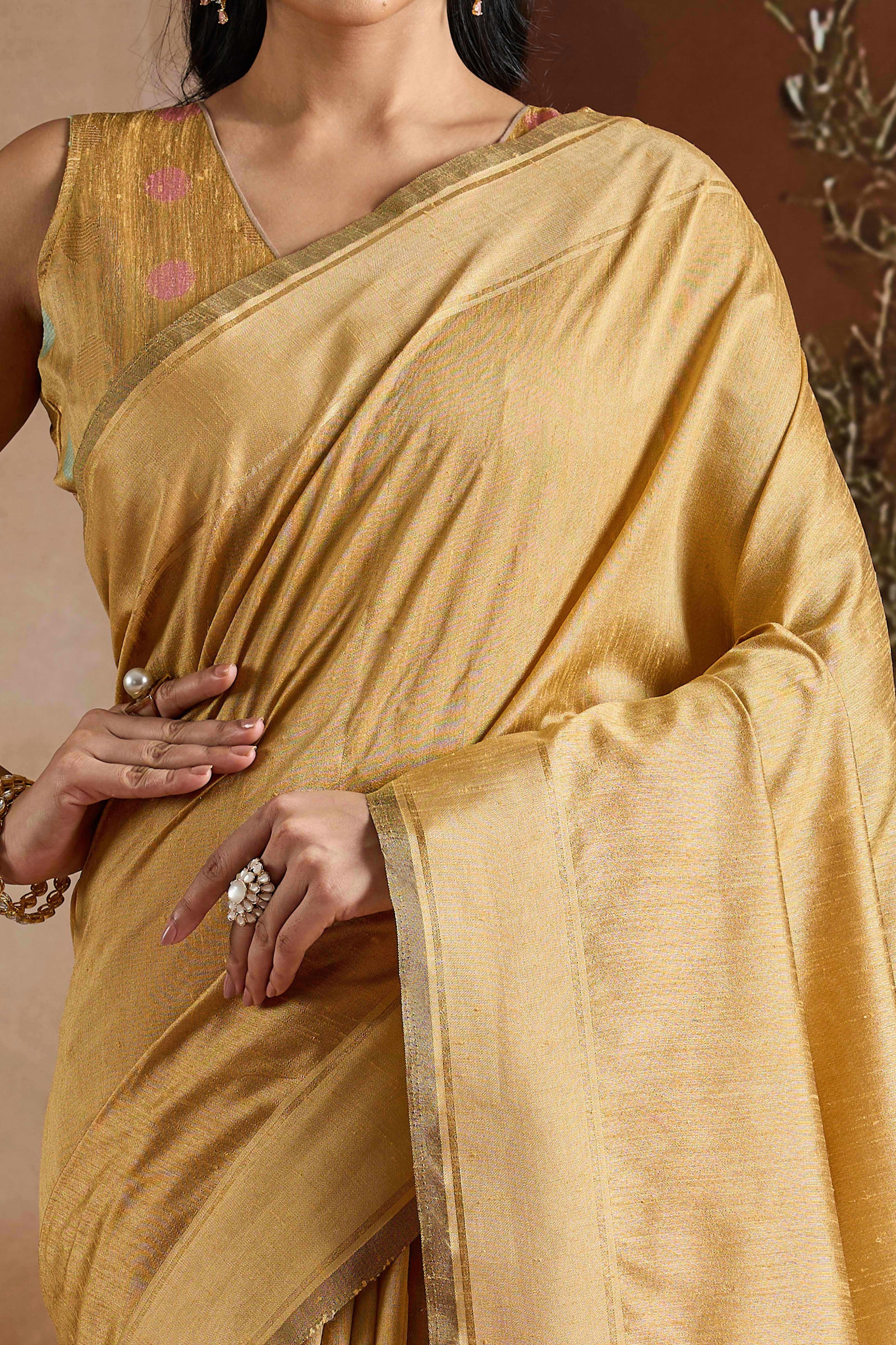 Graceful Chikoo Zari Woven Bhagalpuri Silk Saree Accented With Tassel Pallu