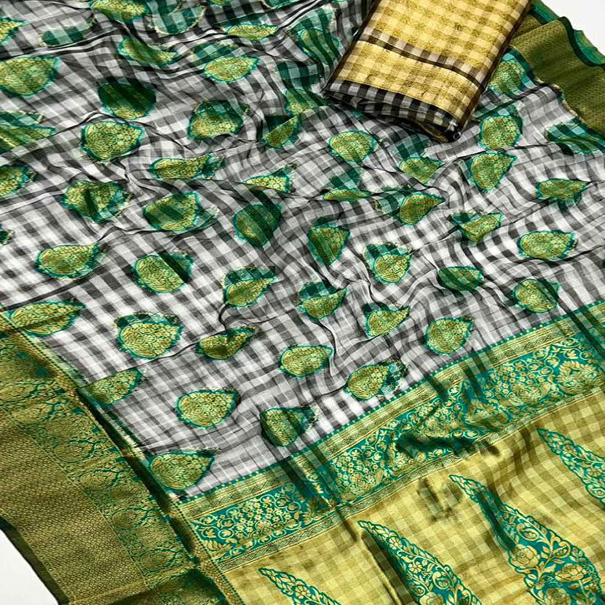 Green Checks Woven Organza Saree With Tassels