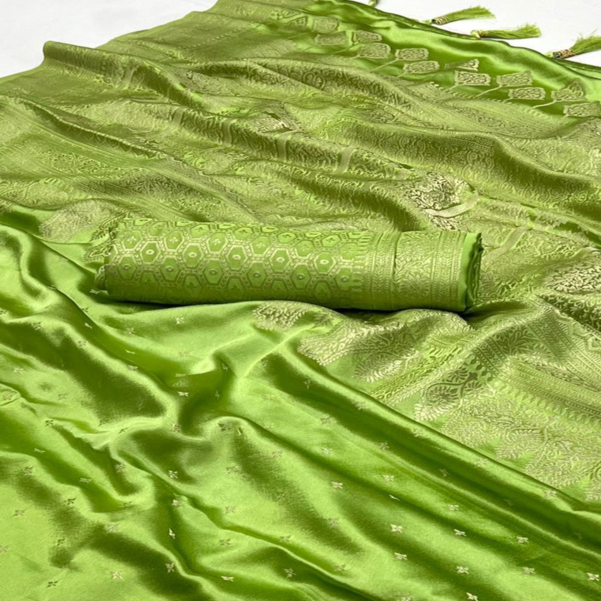 Green Zari Woven Satin Saree With Tassels