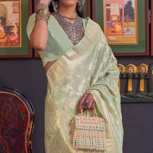 Green Woven Art Silk Saree With Tassels