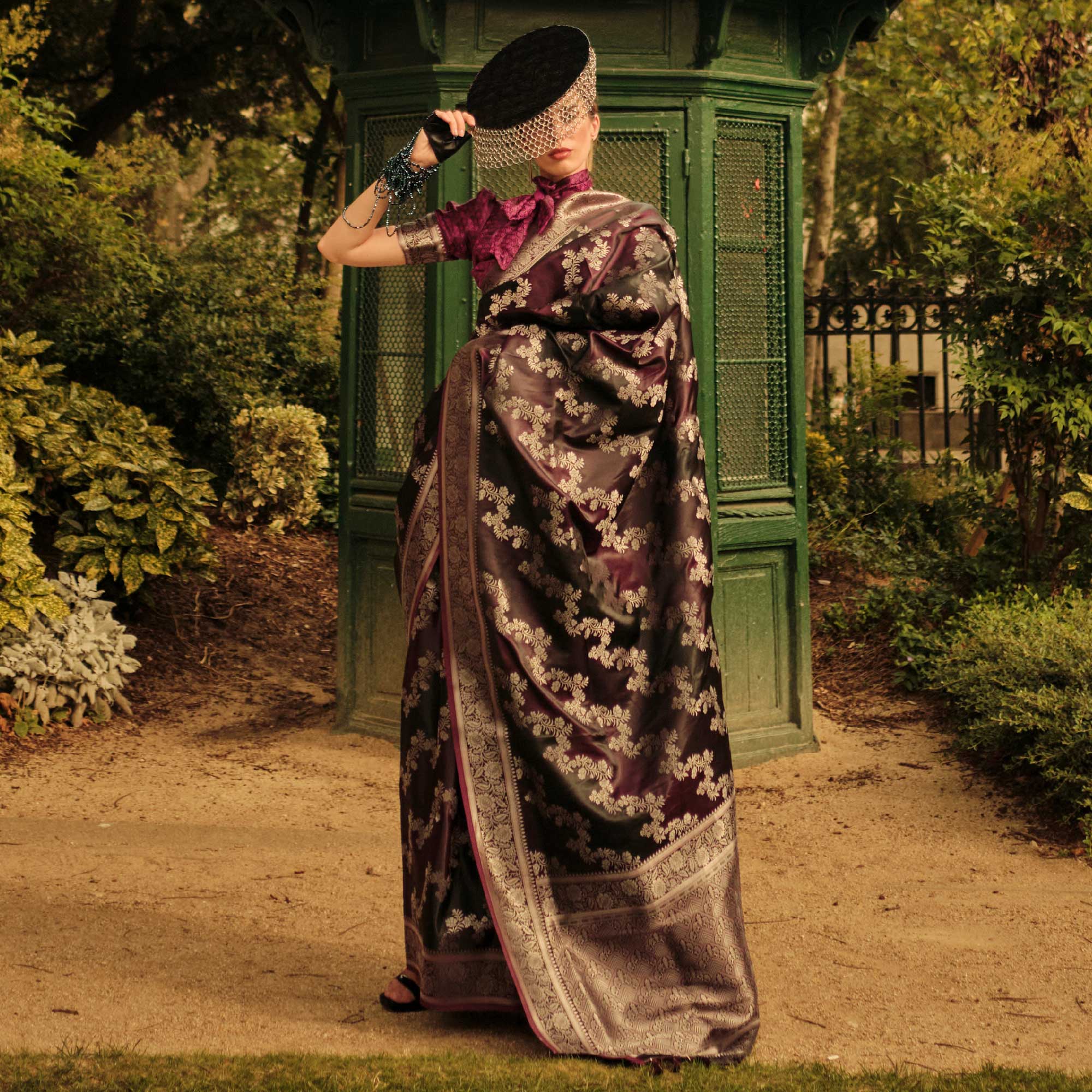 Wine Floral Woven Satin Saree With Tassels