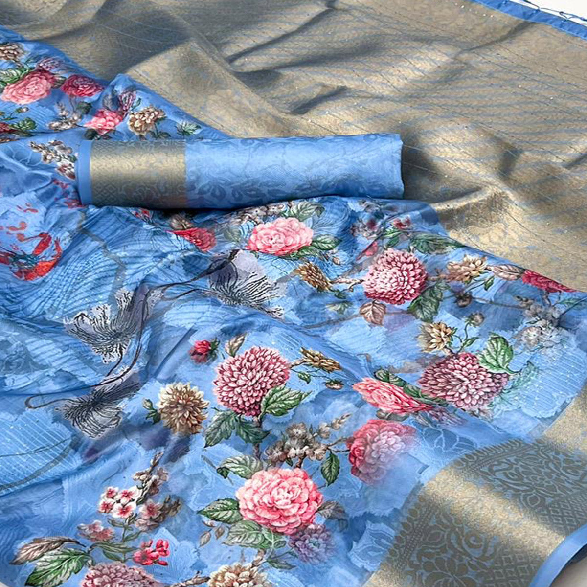 Blue Floral Woven Brasso Saree With Tassels