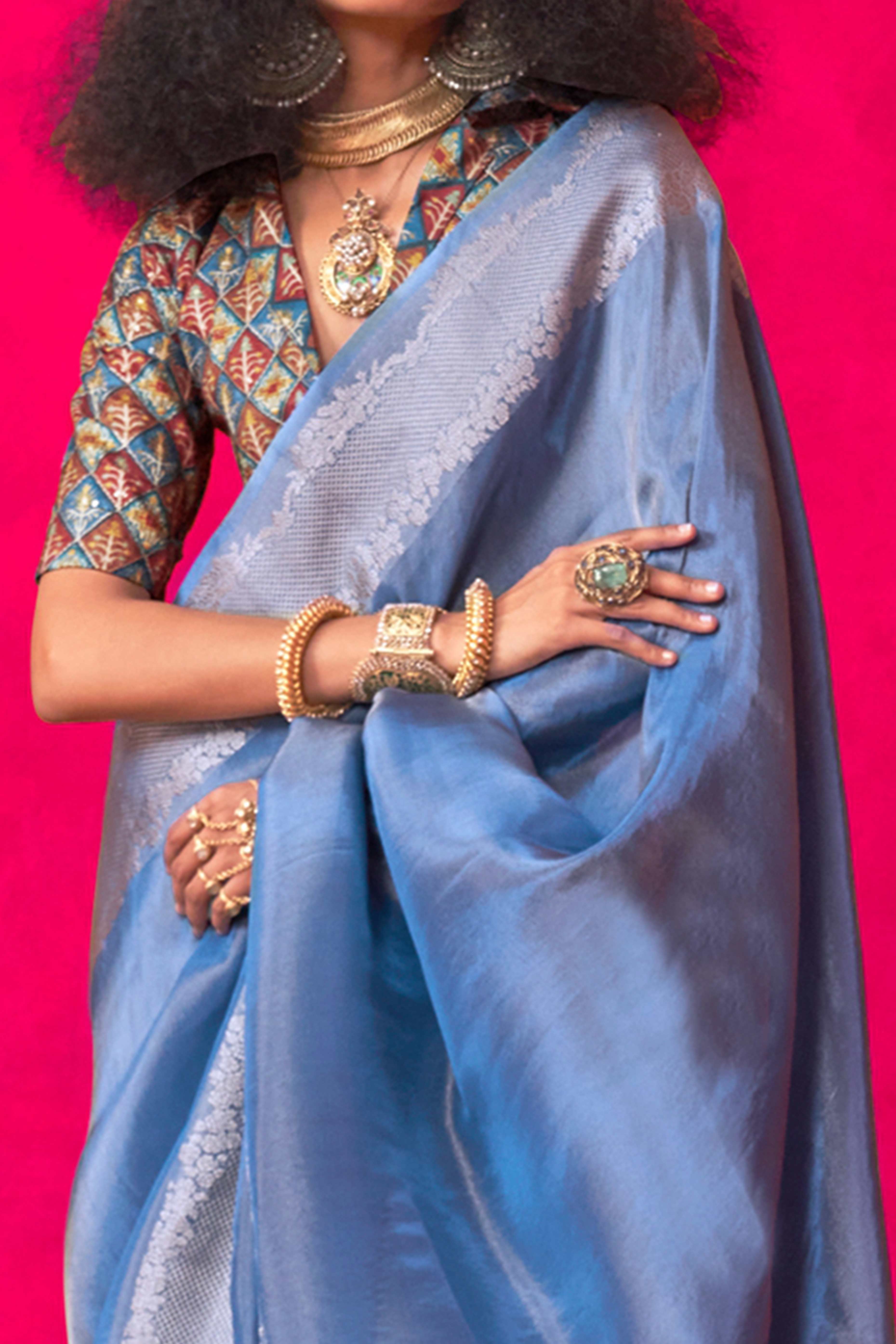 Blue Tissue Saree Adorned with Zari Weaving Border