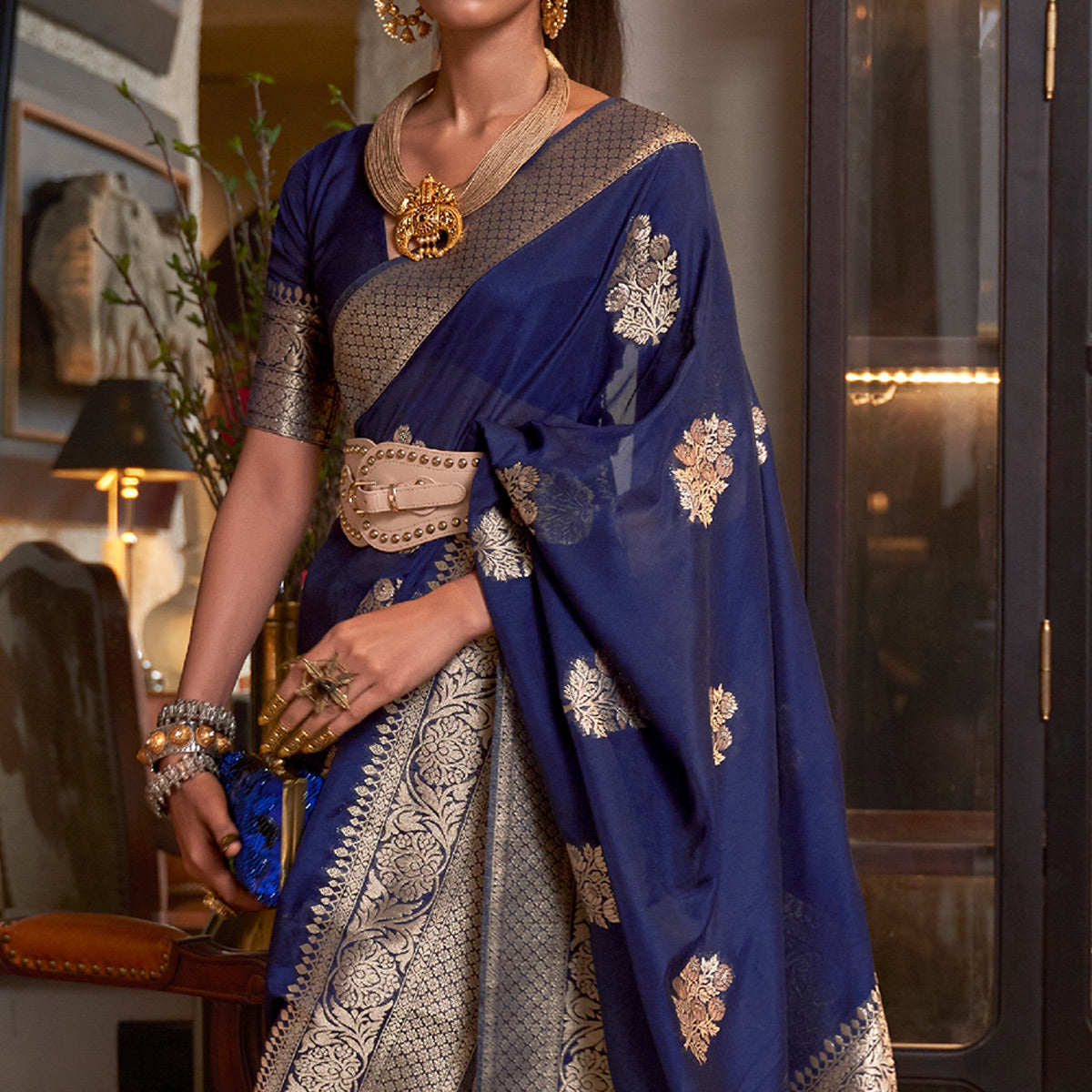 Navy Blue Woven Georgette Saree With Tassels