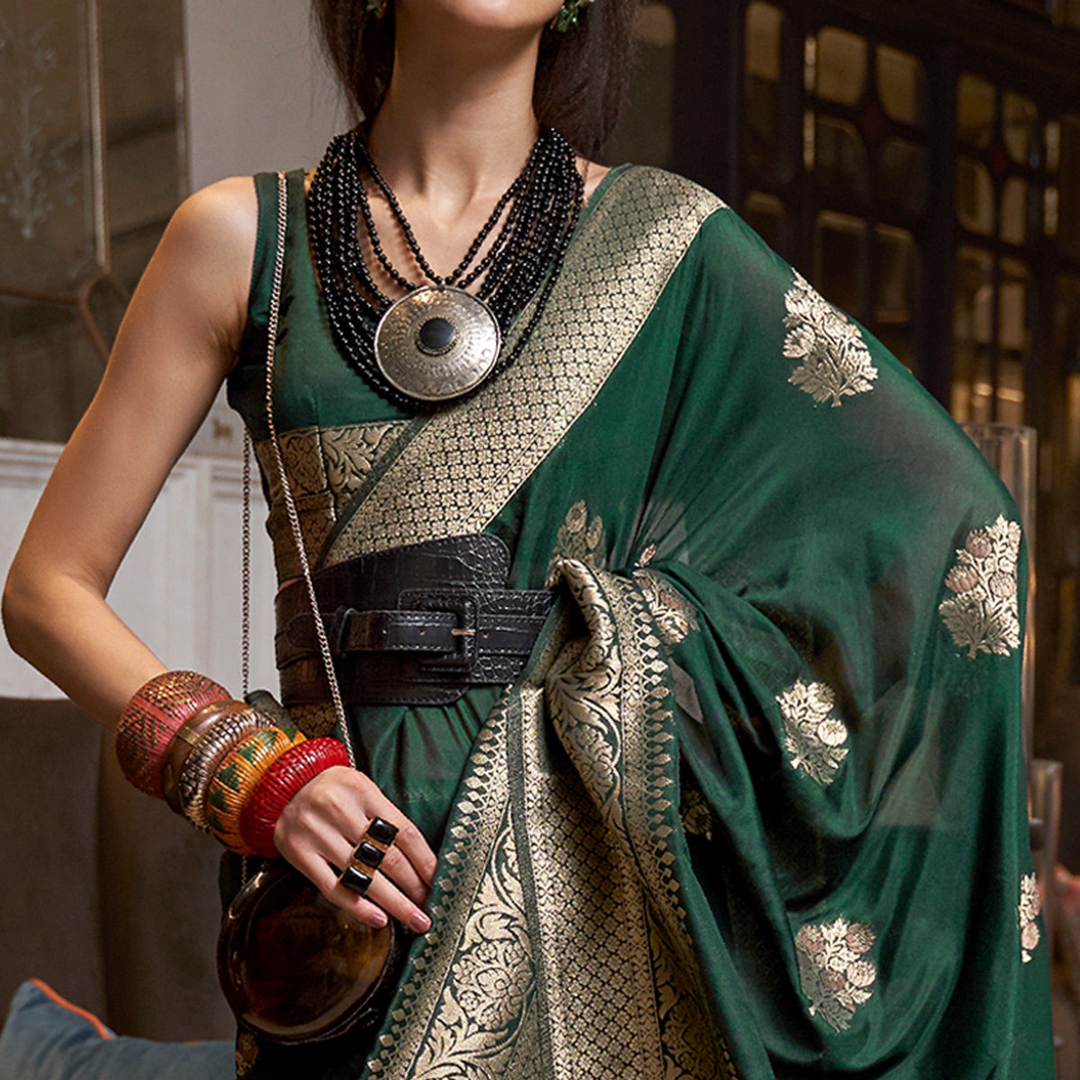 Green Woven Georgette Saree With Tassels