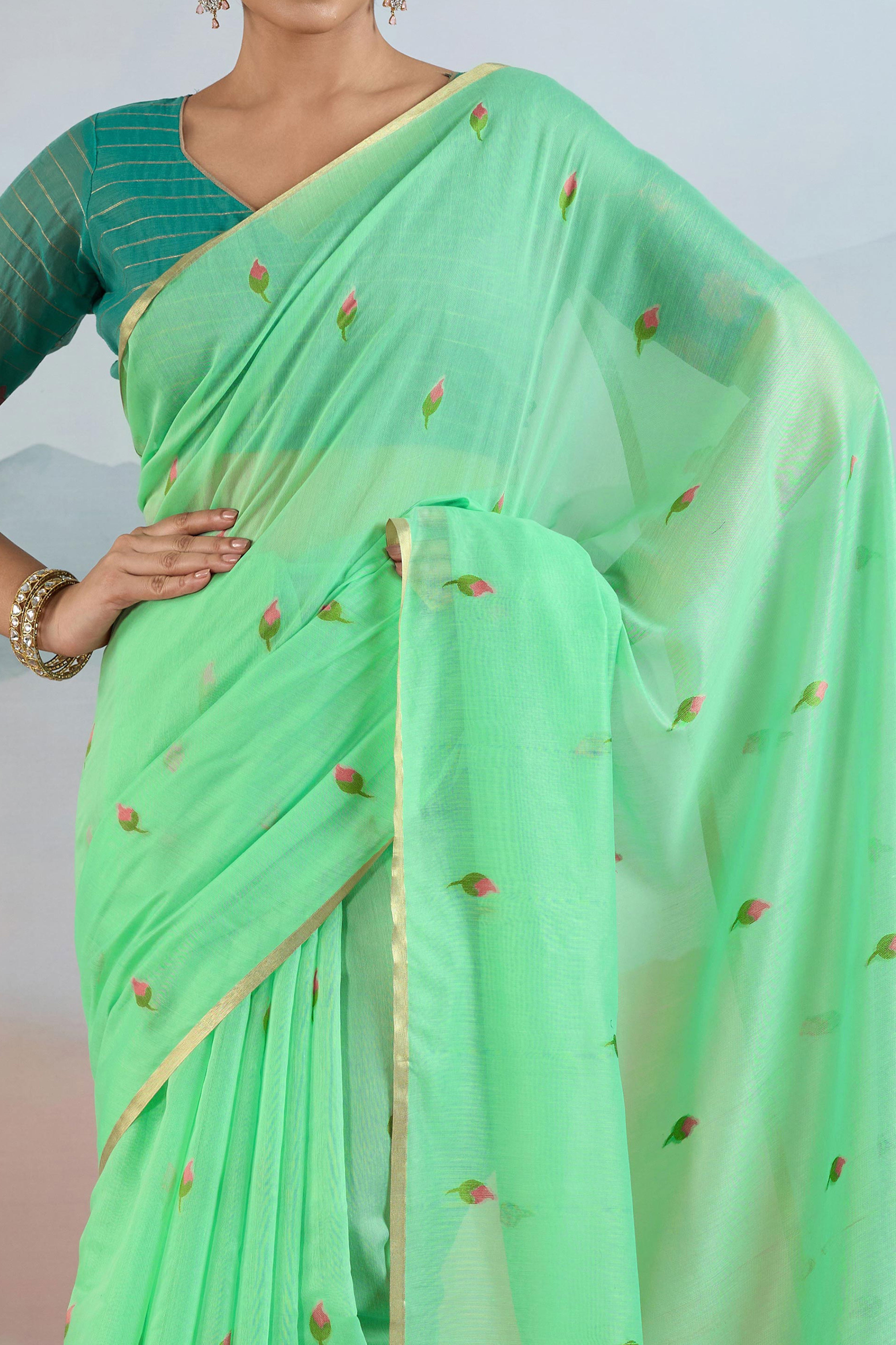 Trendy Sea Green Cotton Blend Weaving Saree Showcasing Floral & Animal Motif & Classic Tassel Pallu
