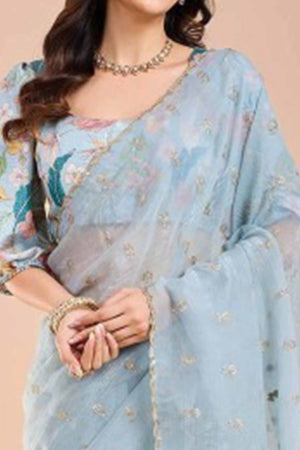 Light Blue Crunchy Saree Adorned With Floral Sequins Embroidery & Graceful Border Finish