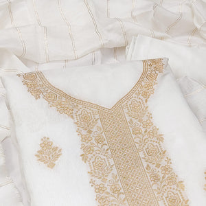 Timeless Offwhite Banarasi Jacquard Dress Material Adorned With Ornate Zari Floral Weaves