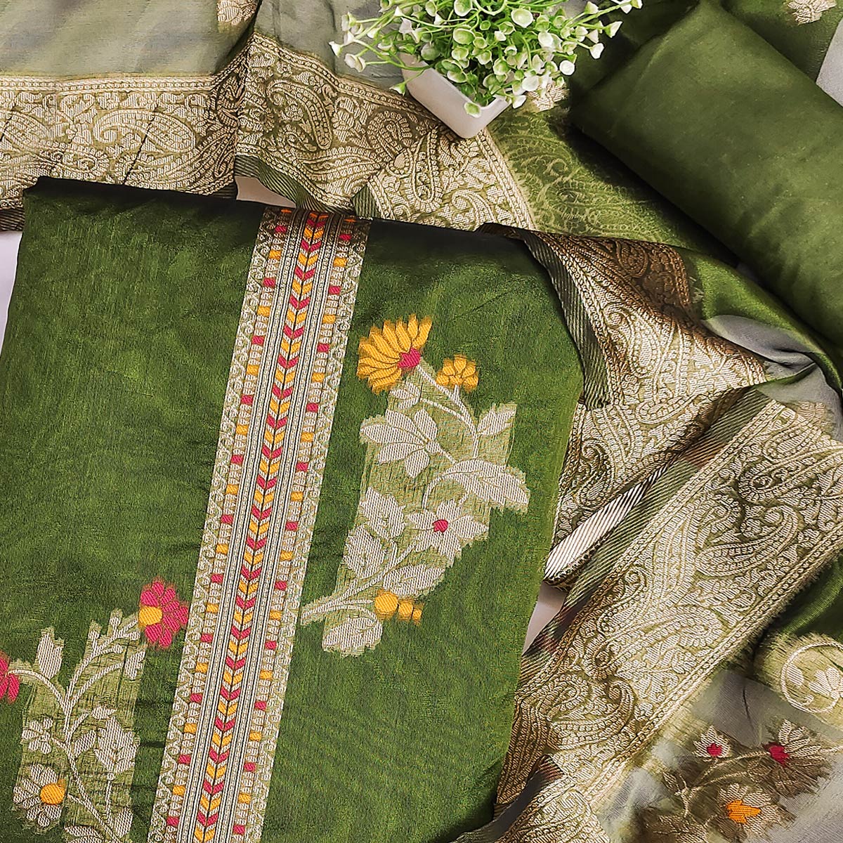 Green Chanderi Silk Dress Material Adorned With Elegant Floral Zari Weaving