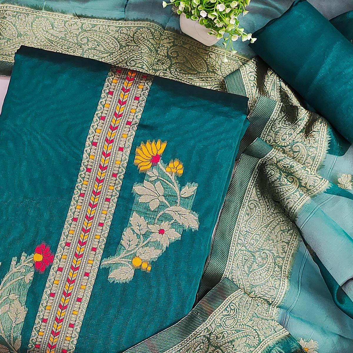 Teal Chanderi Silk Dress Material Adorned With Elegant Floral Zari Weaving