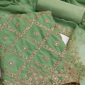 Green Georgette Dress Material Adorned With Floral Zari Embroidery Work