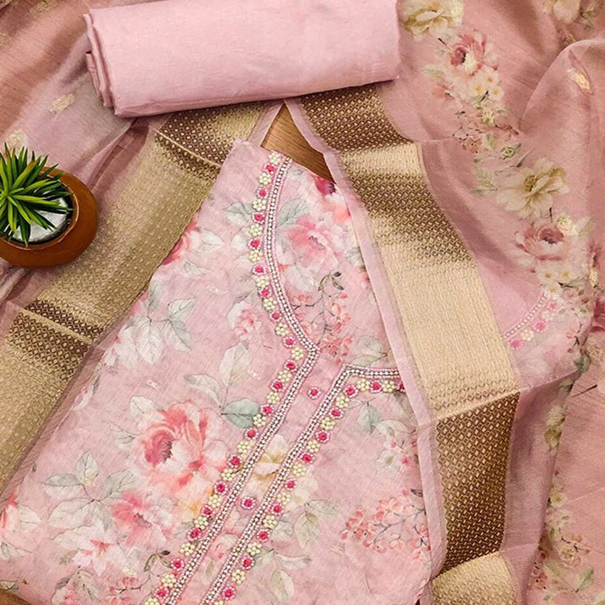 Pink Chanderi Silk Dress Material Showcasing Floral Prints with Subtle Beads Detailing