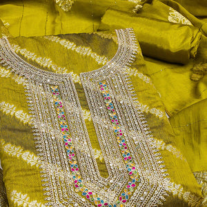 Rich Green Banarasi Silk Dress Material Featuring Floral Weaving & Neck Cording Embroidery