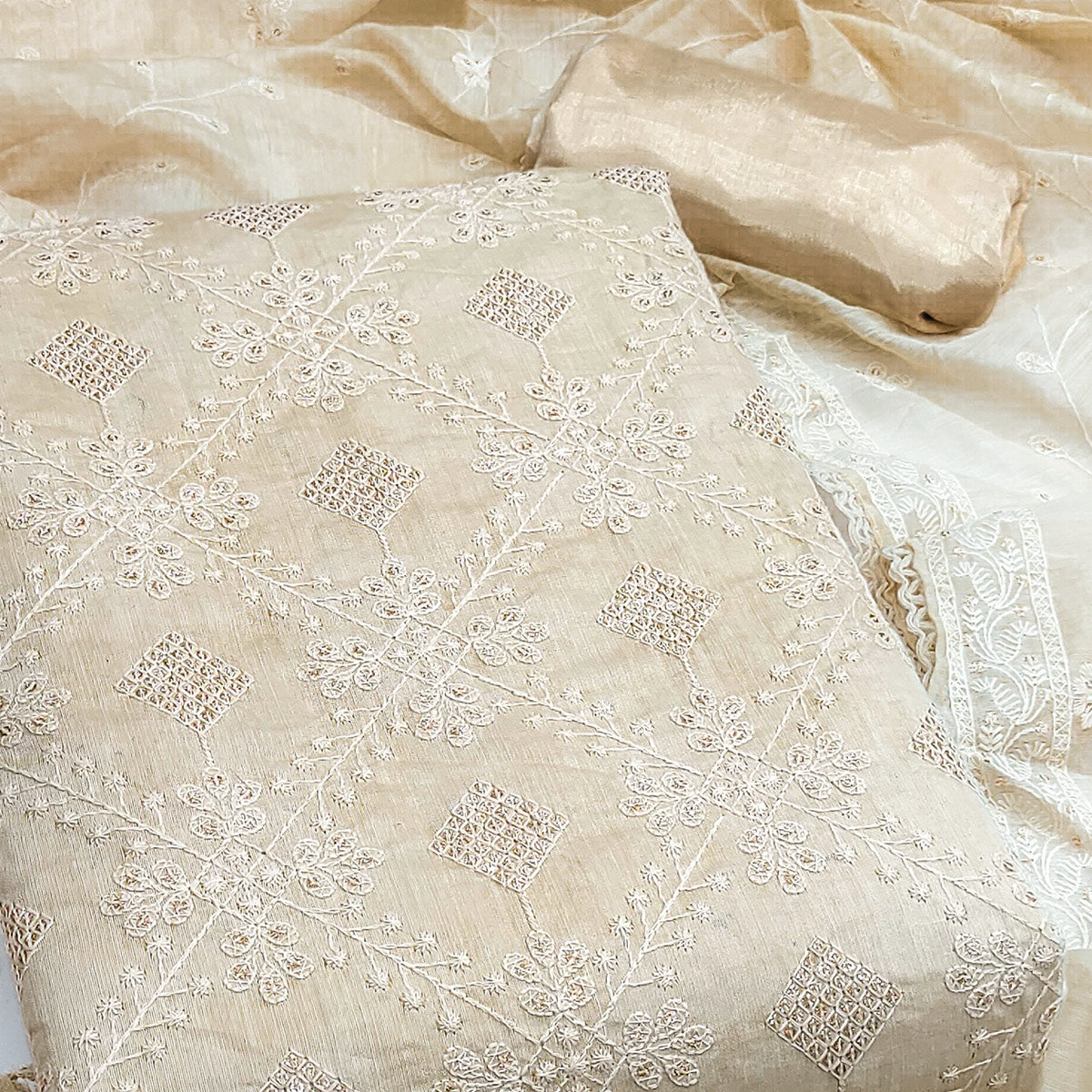 Cream Floral Lucknowi Embroidered Modal Chanderi Silk Dress Material For A Refined Ethnic Look