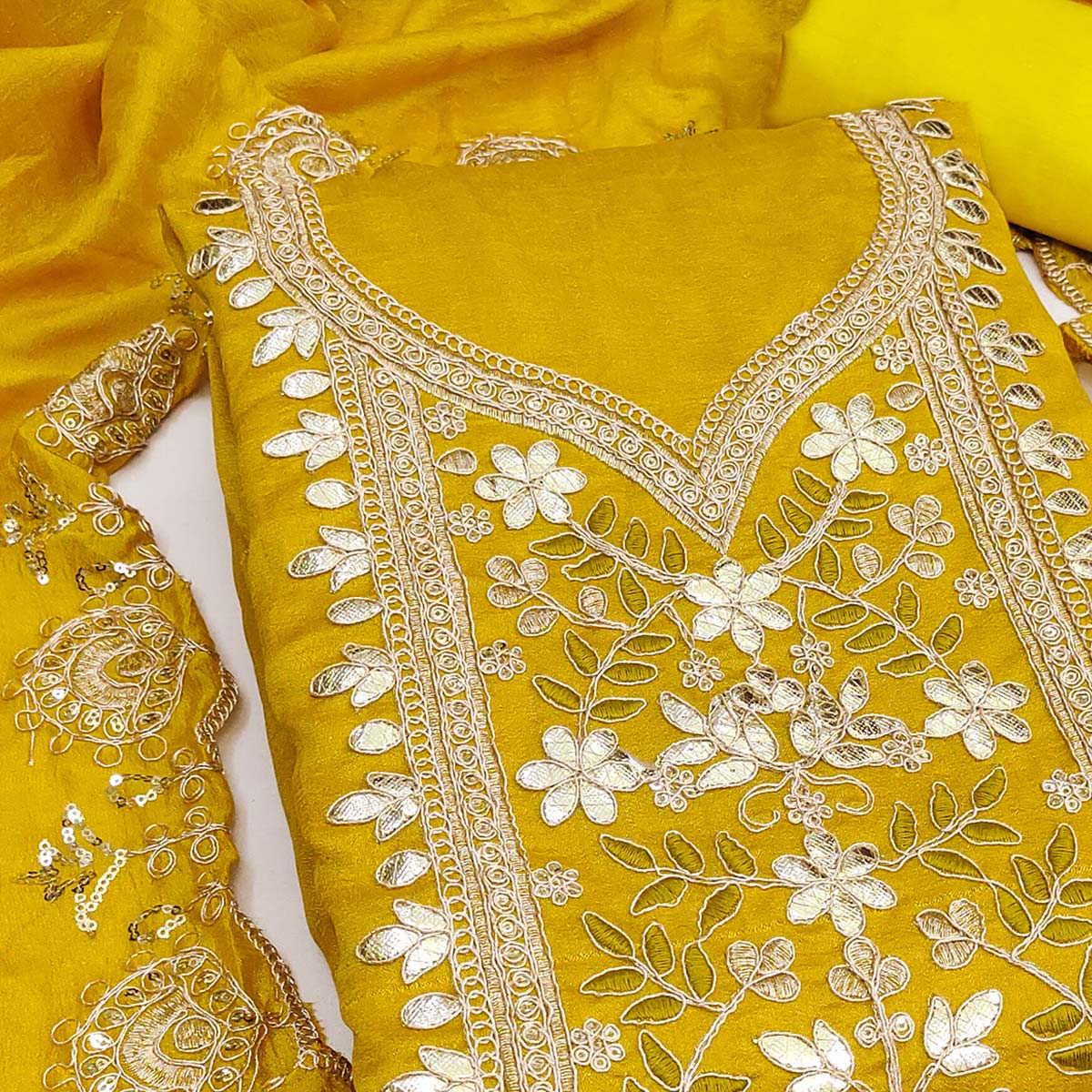 Timeless Mustard Floral Embroidered Vichitra Silk Dress Material Highlighted With Gota Patti Work
