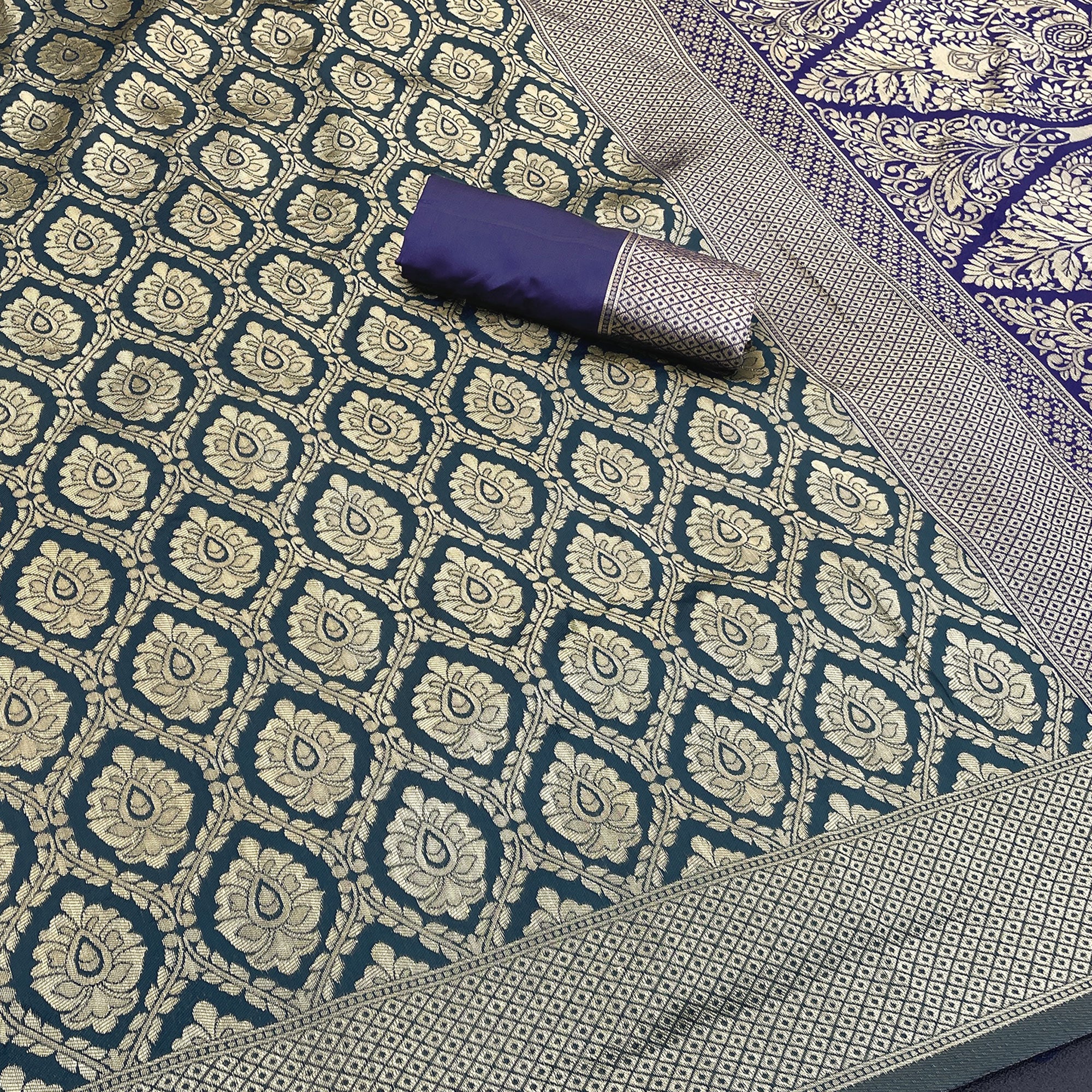 Charming Dark Teal Banarasi Silk Saree Adorned With Floral Zari Weaving