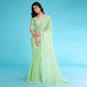 Green Solid With Zarkan & Ceramic Pearl Diamond Lace Tissue Saree