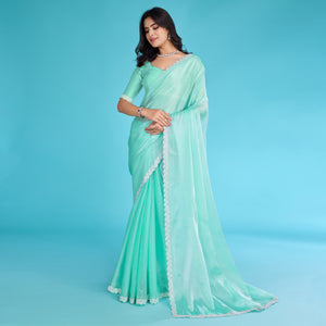 Turquoise Solid With Zarkan & Ceramic Pearl Diamond Lace Tissue Saree