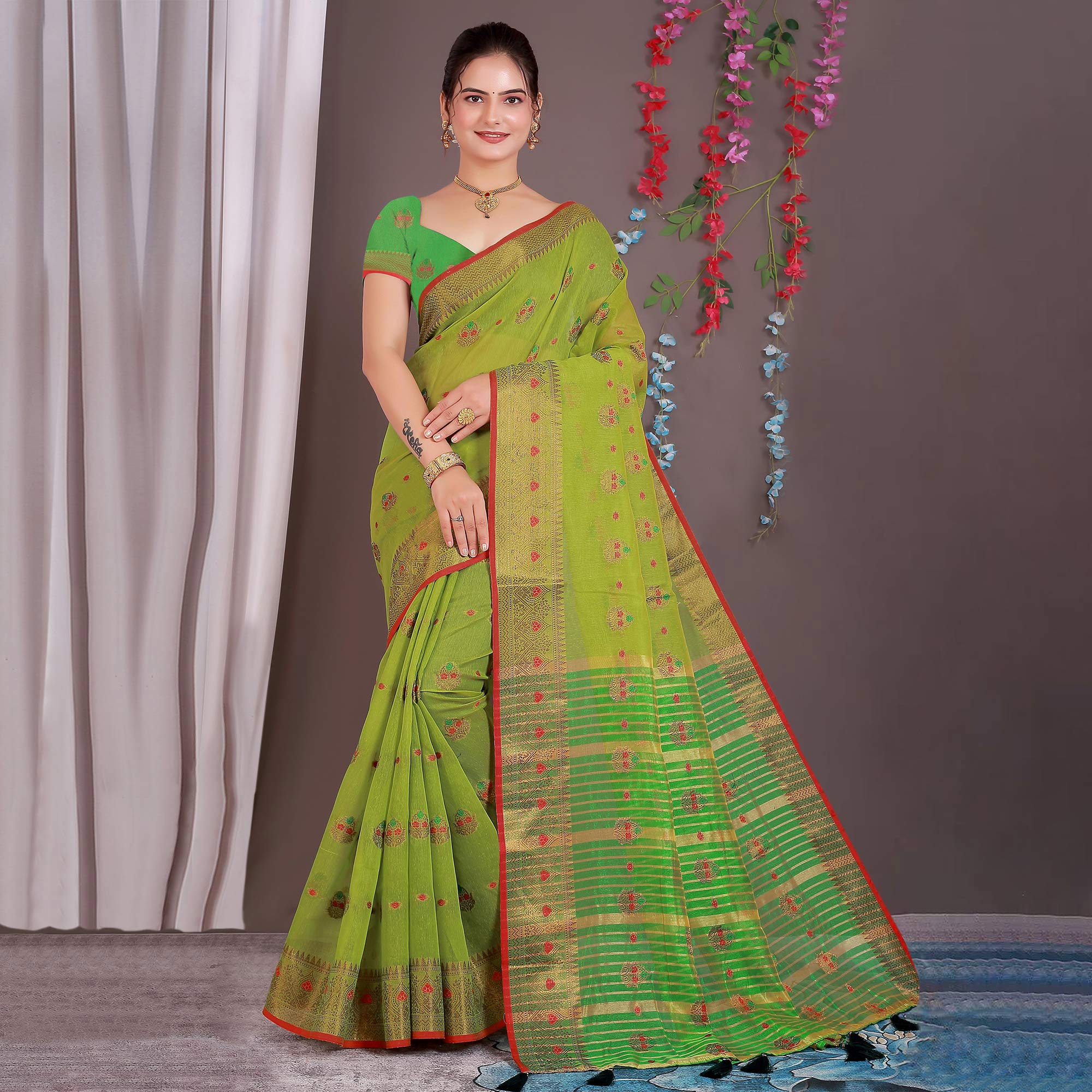 Green Floral Woven Cotton Silk Saree With Tassels
