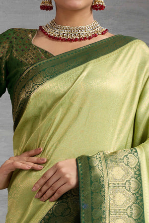 Green Kanjivaram Silk Saree In Kadiyal Style Zari Weaving With Ornate Meenakari Pallu