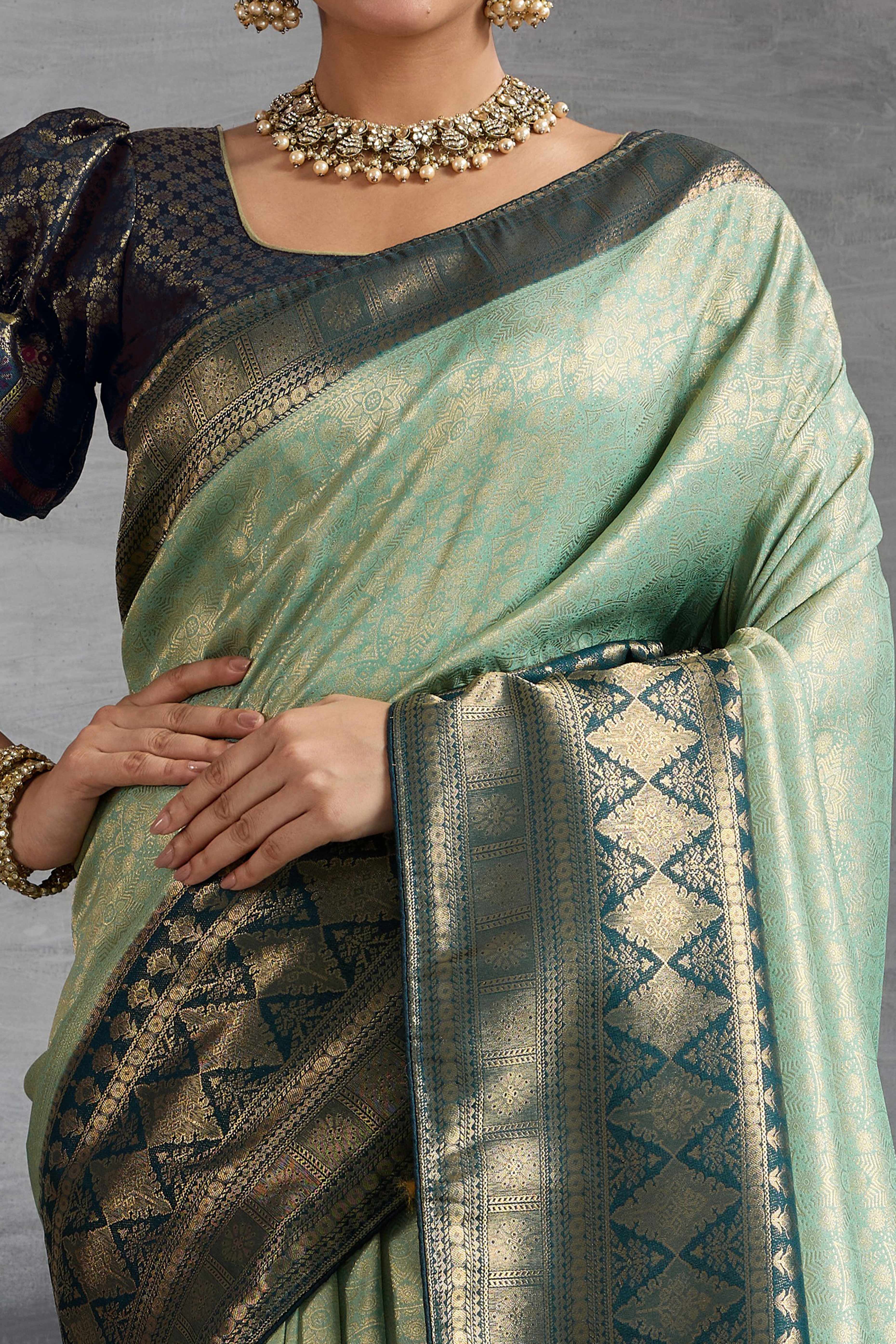 Sea Green Silk Kanjivaram Silk Saree Enhanced With Meenakari Weaving Borders