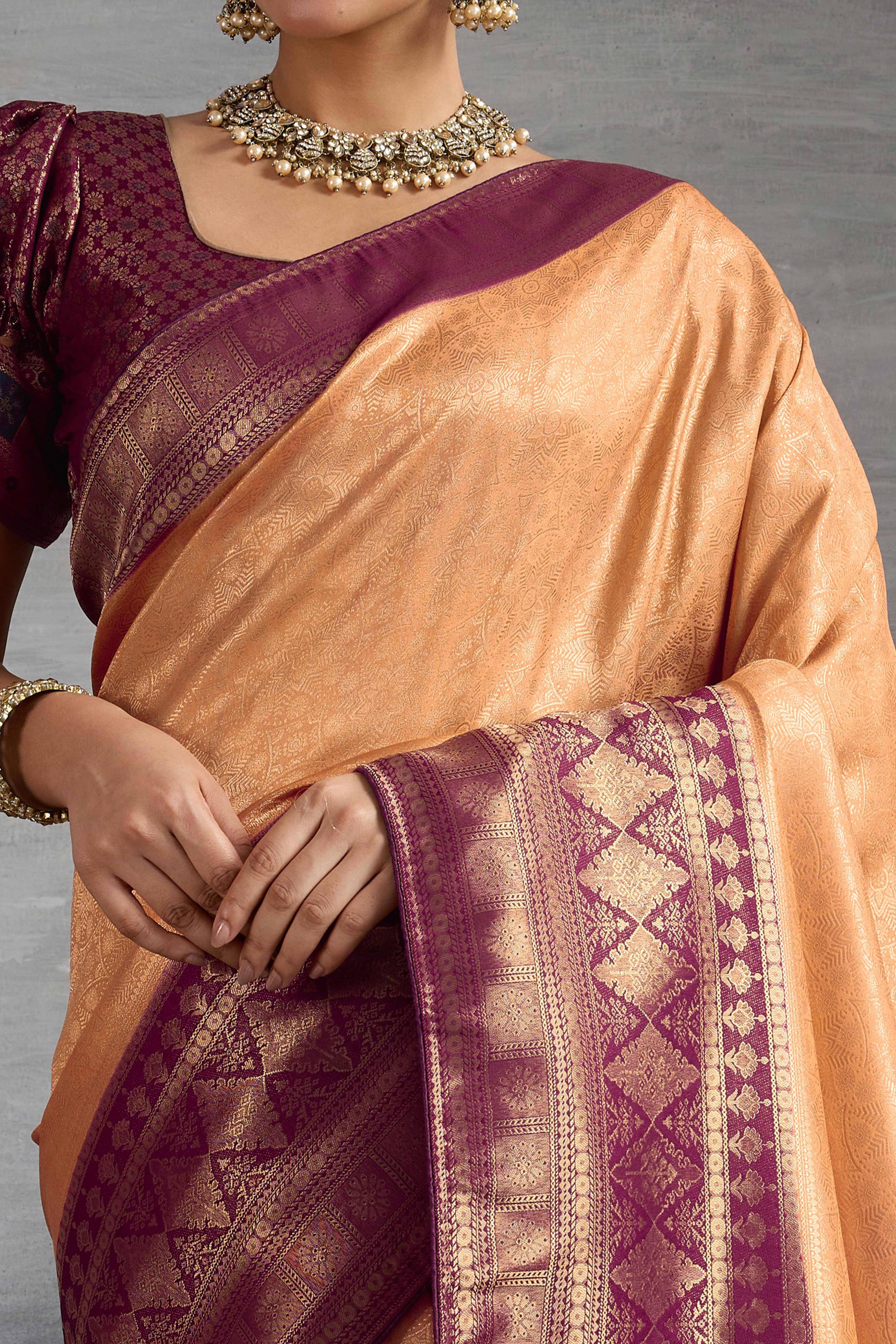 Peach Silk Kanjivaram Silk Saree Enhanced With Meenakari Weaving Borders