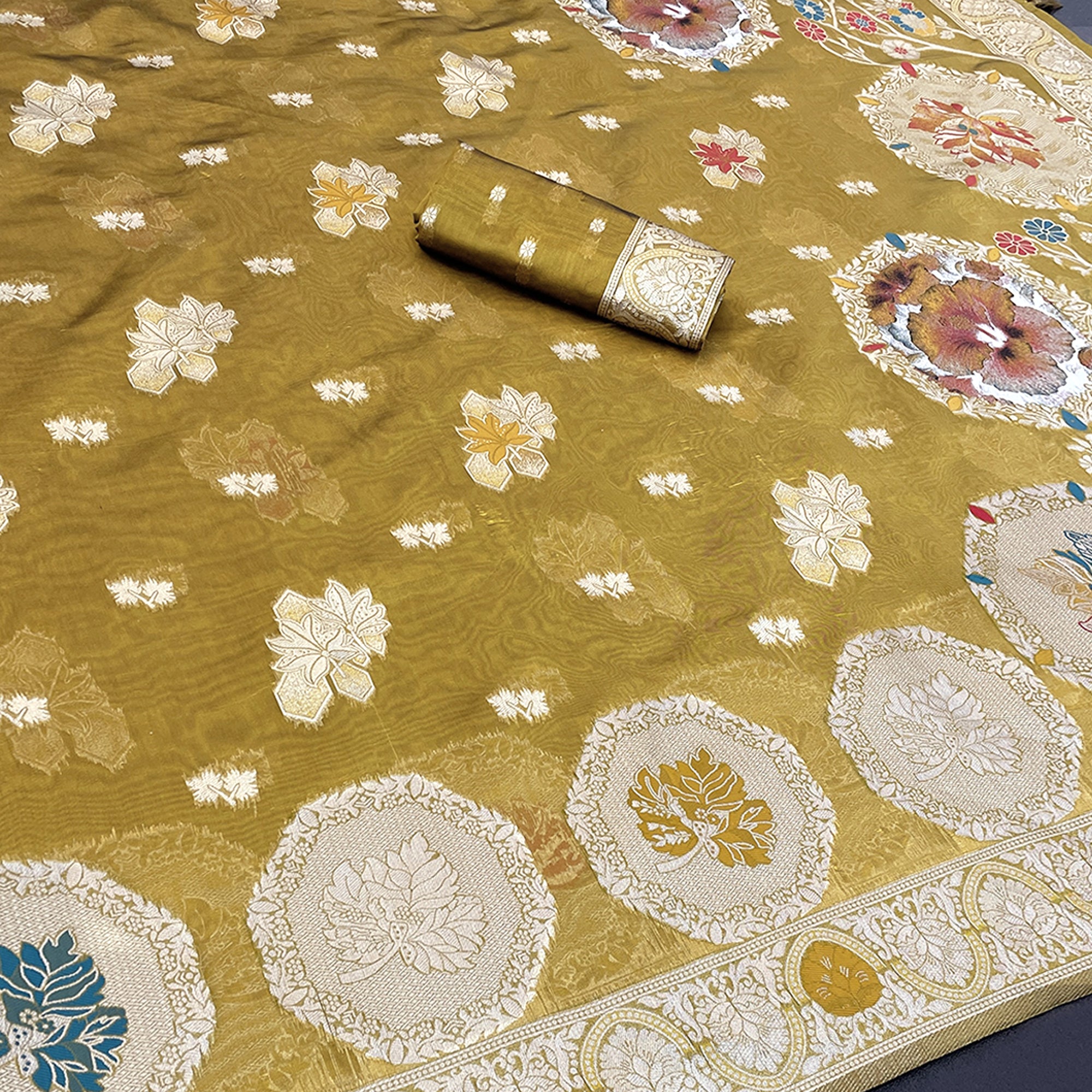 Charming Mehendi Green Zari Woven Floral Organza Saree Accented With Digital Printed Pallu & Latkan