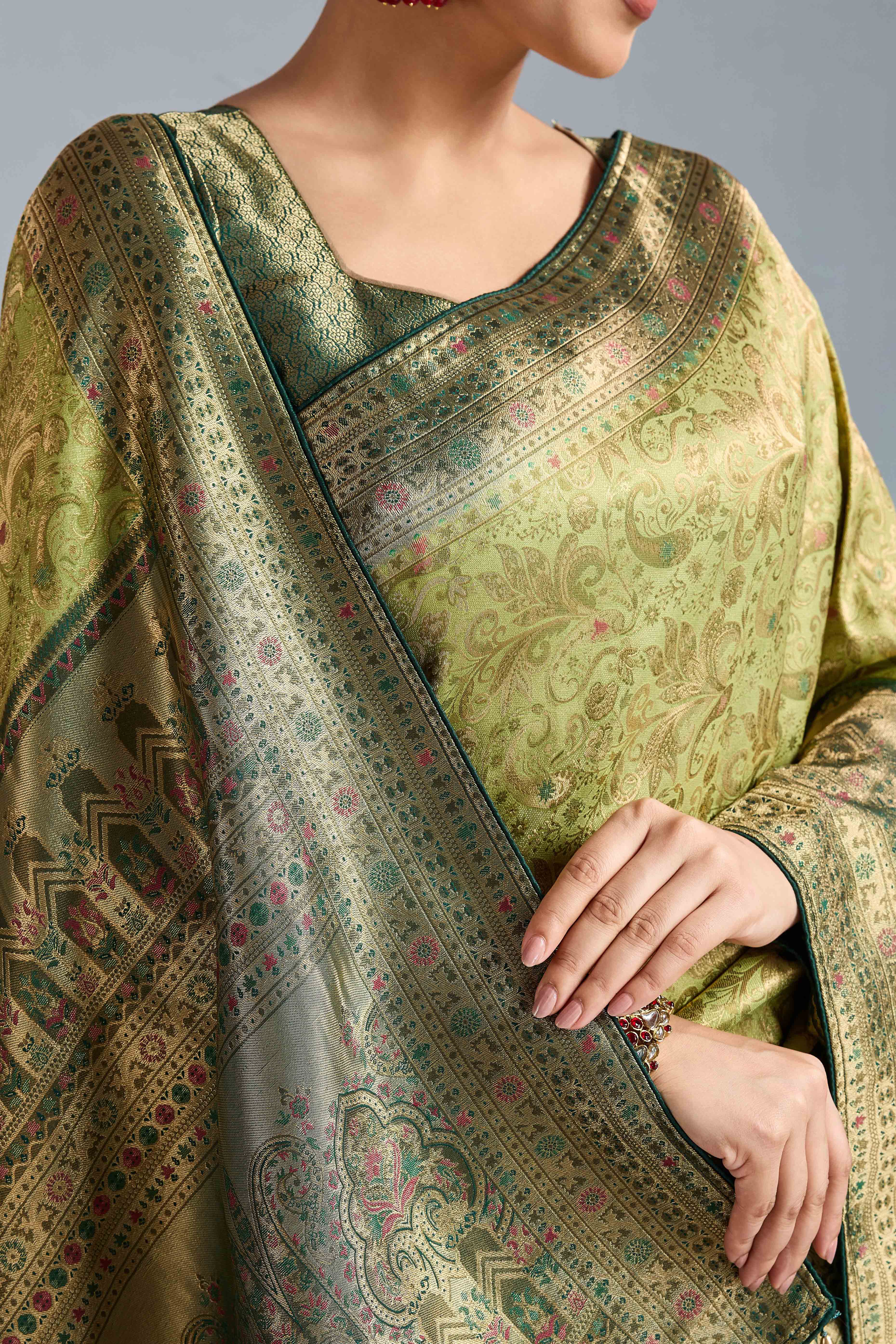 Pista Green Floral Meenakari Weaving Kanjivaram Silk Saree With Rich Piping & Tassel Pallu