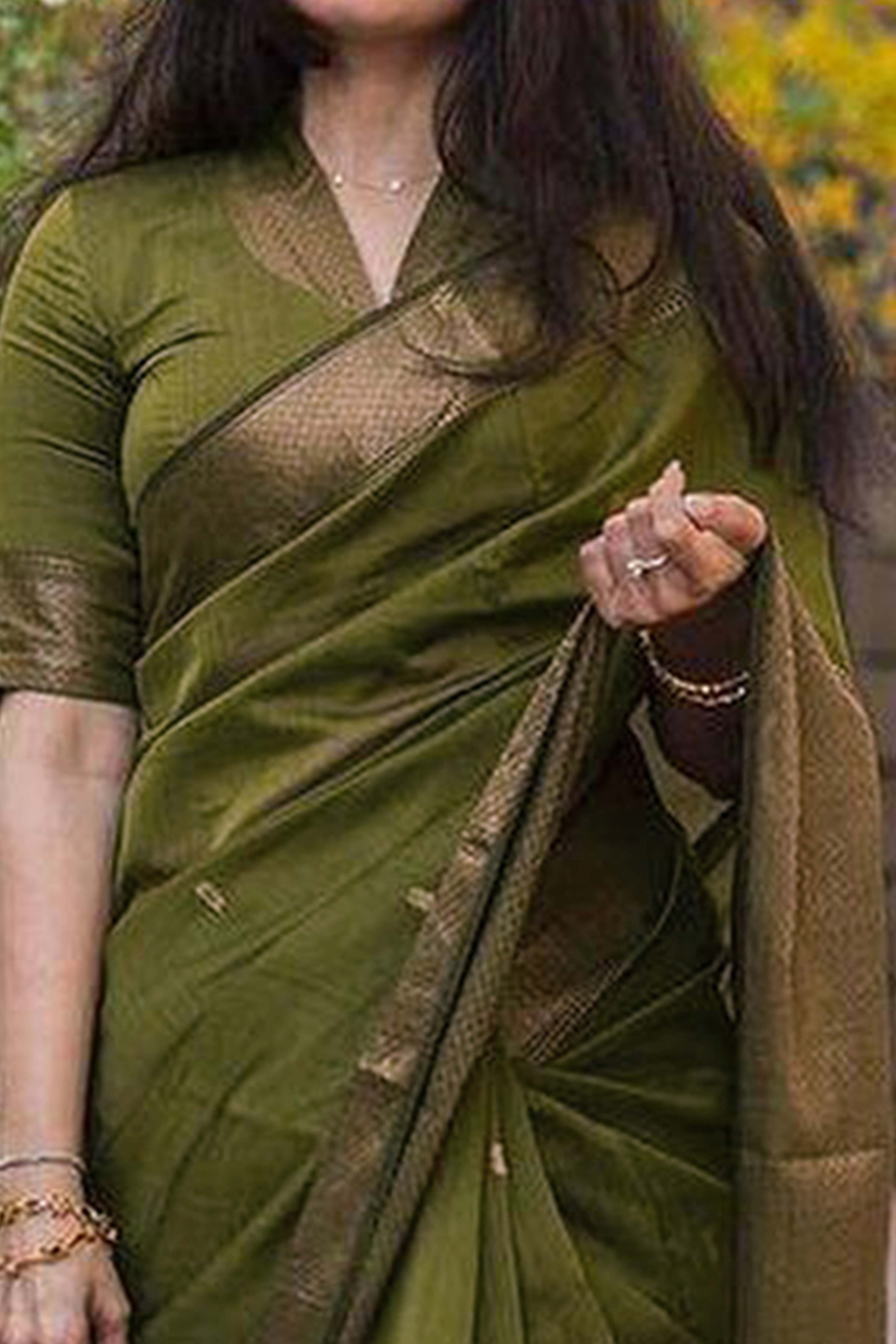 Exquisite Mehendi Green Floral Zari Woven Lichi Banarasi Silk Saree