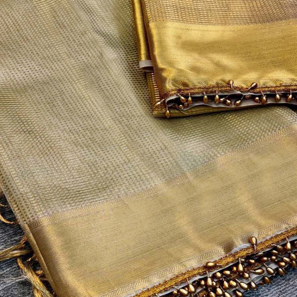 Opulent Banarasi Golden Tissue Silk Saree Crafted on Handloom with a Classic Royal Appeal