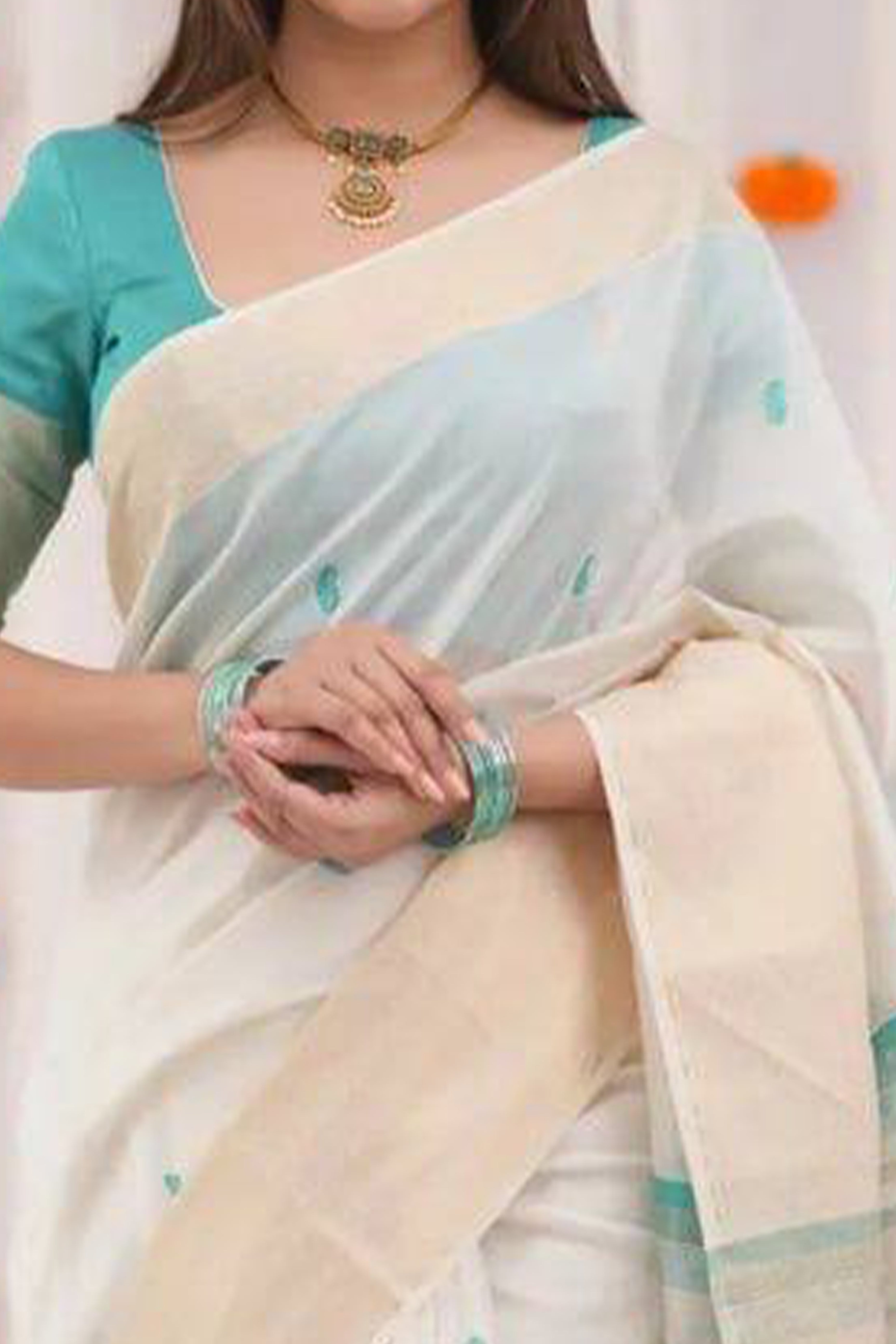 White and Turquoise Zari-Woven Linen Cotton Saree Offering a Refined Festive Look