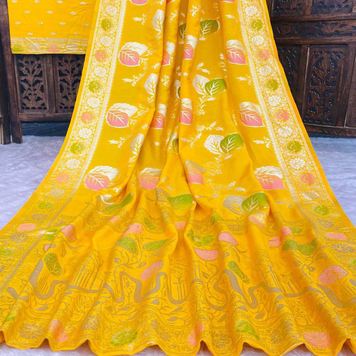 Yellow Soft Dola Silk Saree Adorned with Intricate Meenakari-Style Weaving