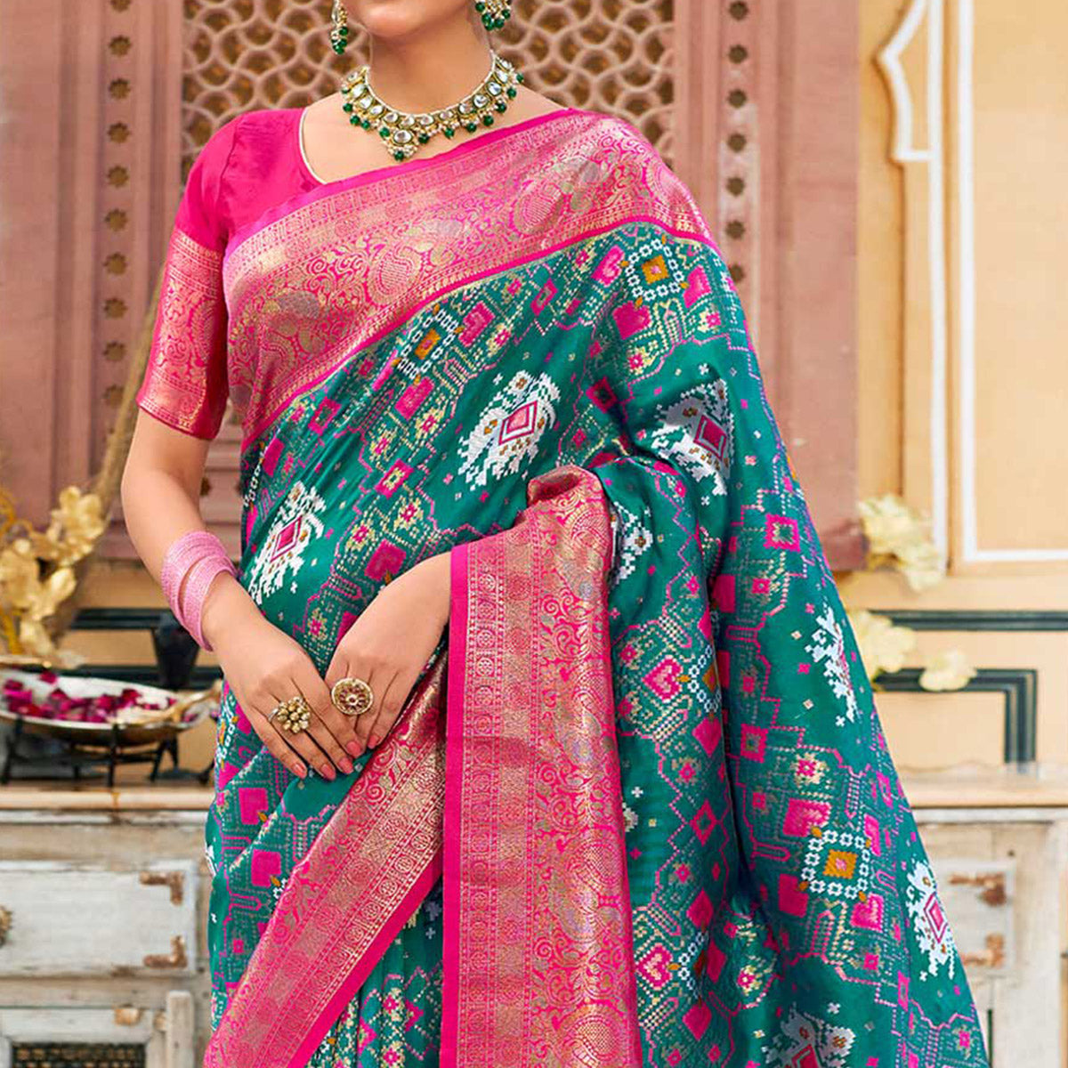 Teal Woven Art Silk Patola Saree With Tassels
