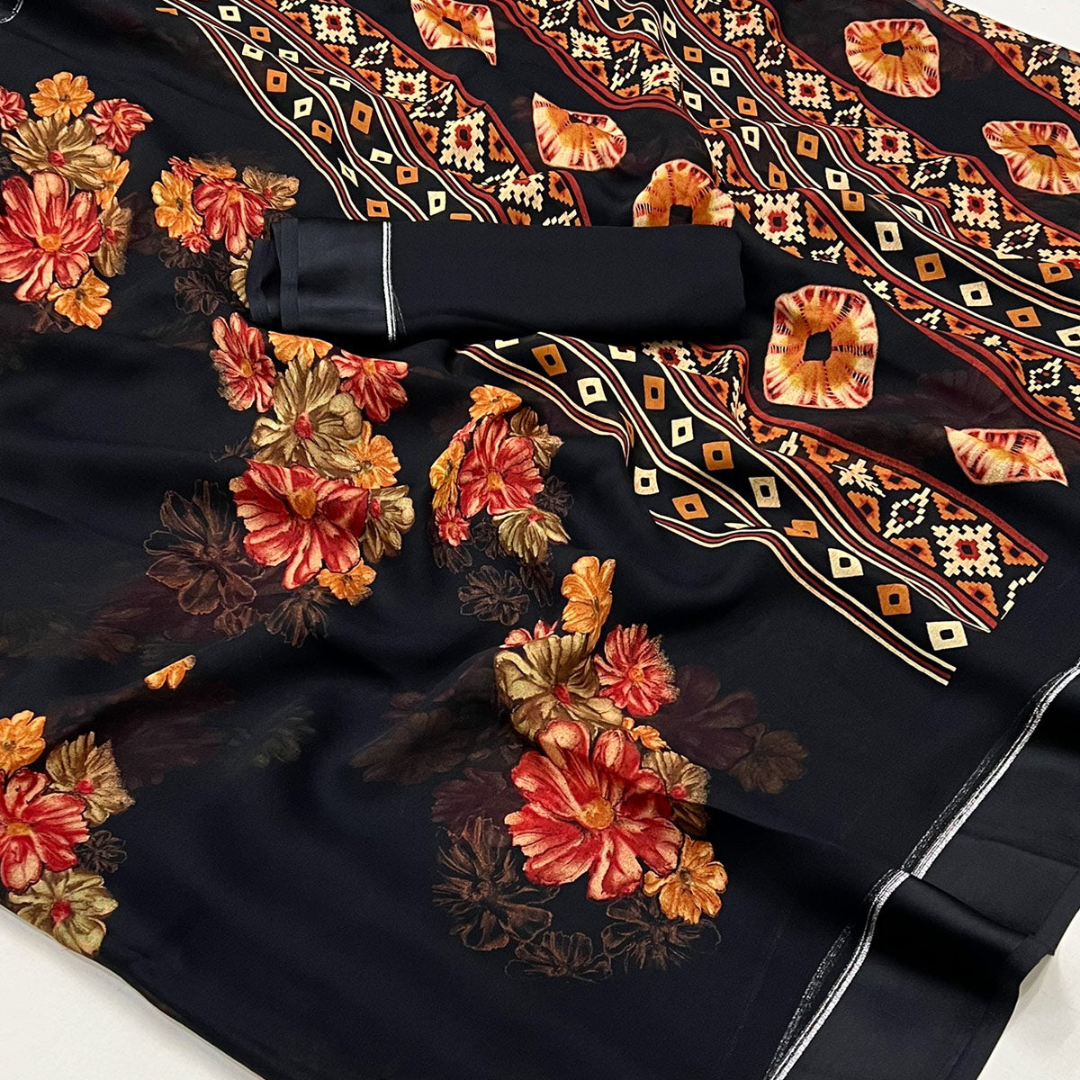 Black Floral Printed Georgette Saree With Fancy Zari Border
