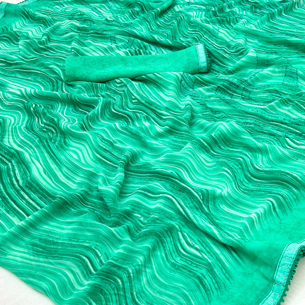 Rama Green Printed Georgette Saree With Fancy Lace Border