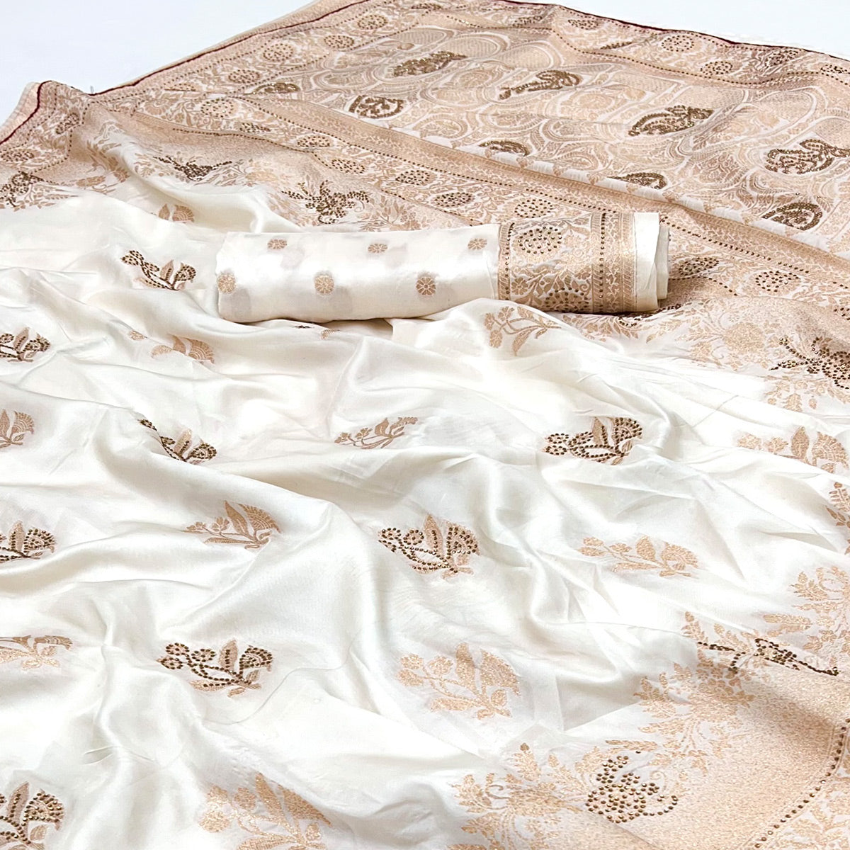 Offwhite Elegant White Dola Silk Saree with Intricate Weaving and Sparkling Stonework