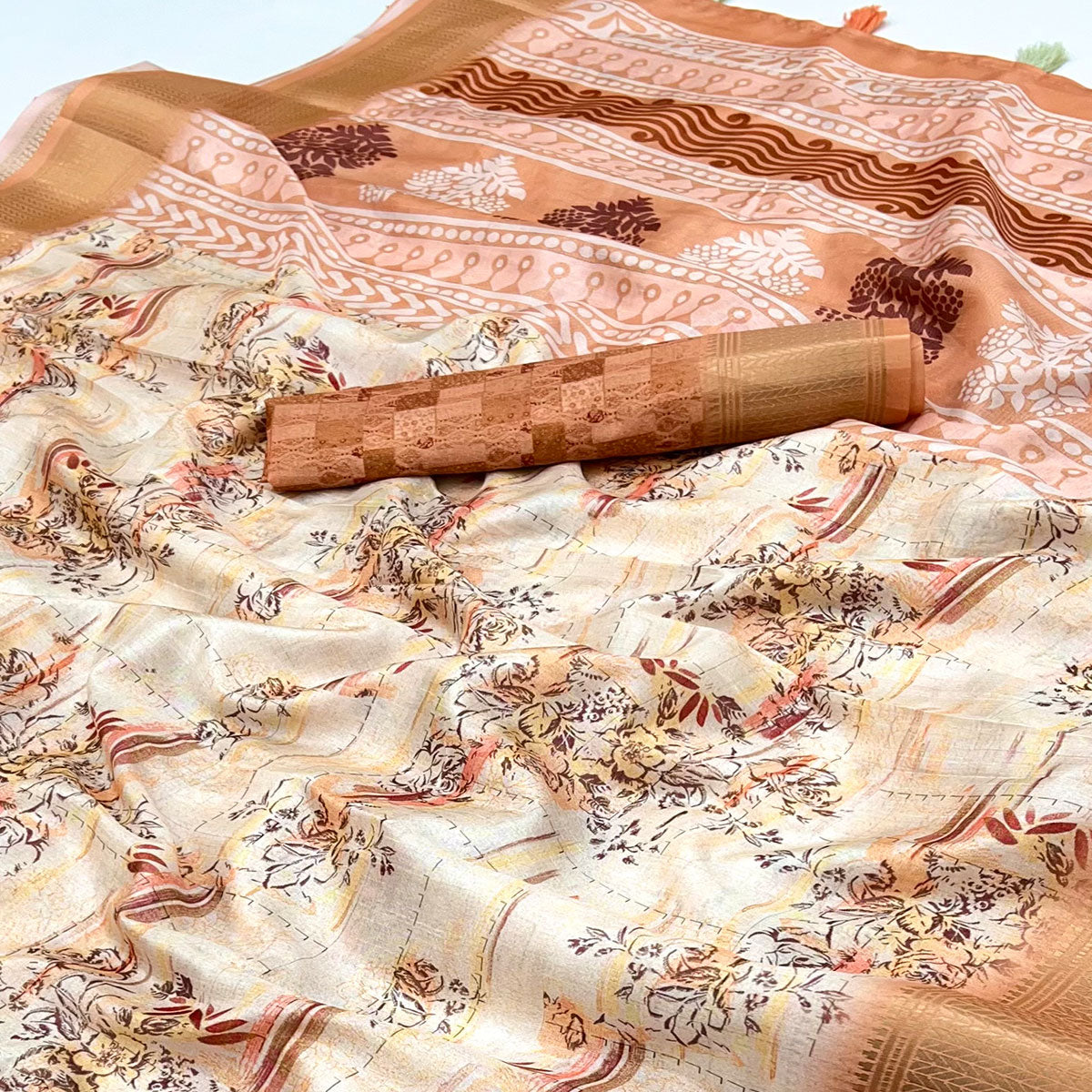 Floral Digital Printed Light Peach Dola Silk Saree Accented With Intricate Woven Border & Tassel