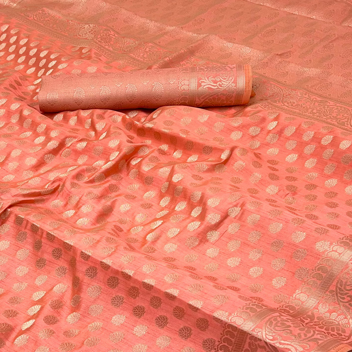 Peach Tusser Cotton Silk Saree Featuring Intricate Floral Zari Weave & Tassel Pallu