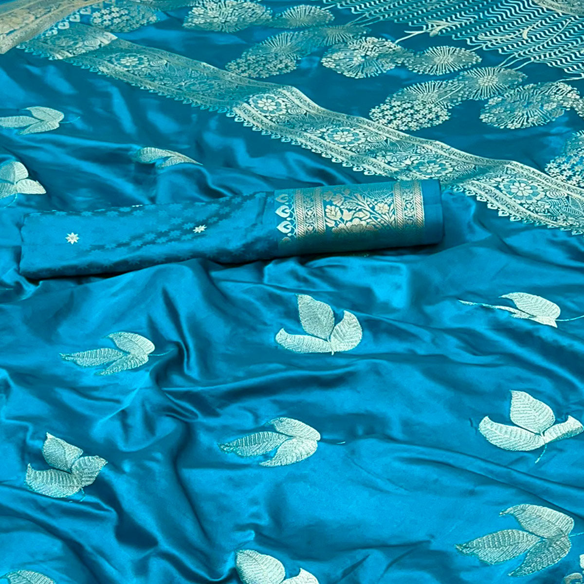 Blue Floral Zari Woven Satin Silk Saree With Graceful Tassel Pallu
