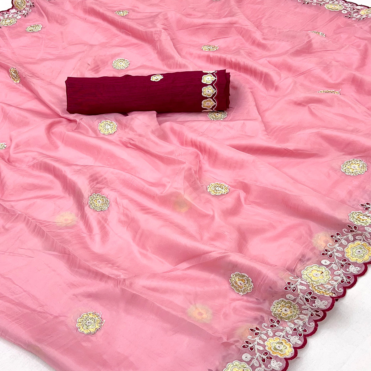 Pink Organza Saree Adorned with Intricate Floral Embroidery