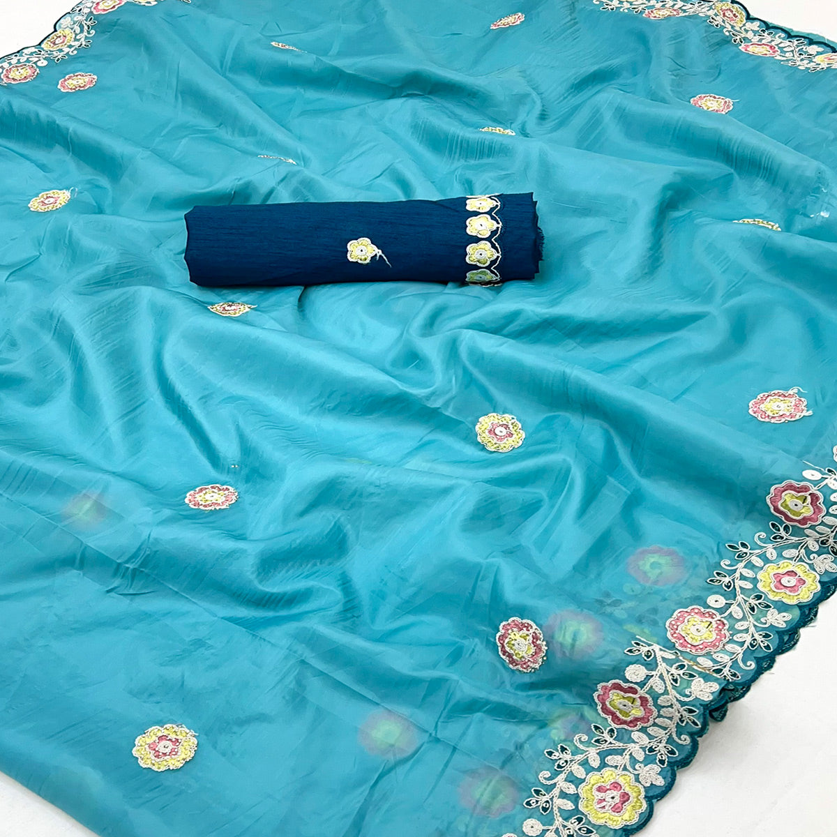 Blue Organza Saree Adorned with Intricate Floral Embroidery