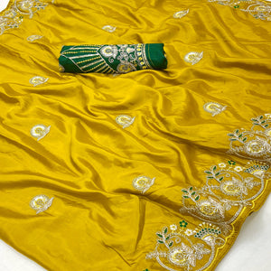 Mustard Embroidered Satin Saree with Smooth Texture and Graceful Festive Appeal