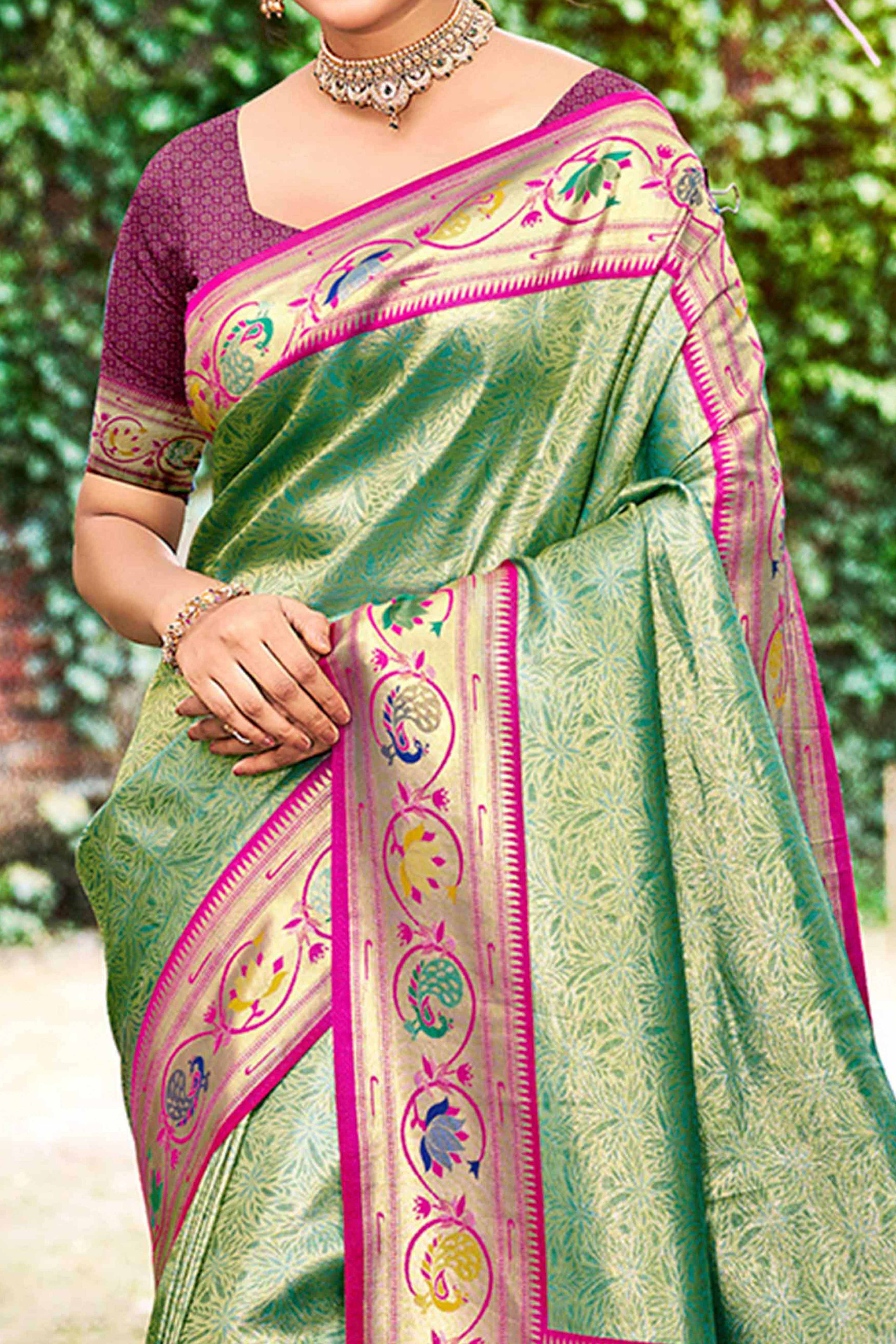 Elegant Rama Green Weaving Silk Blend Saree With Peacock Border & Artistic Parrot Motif Pallu