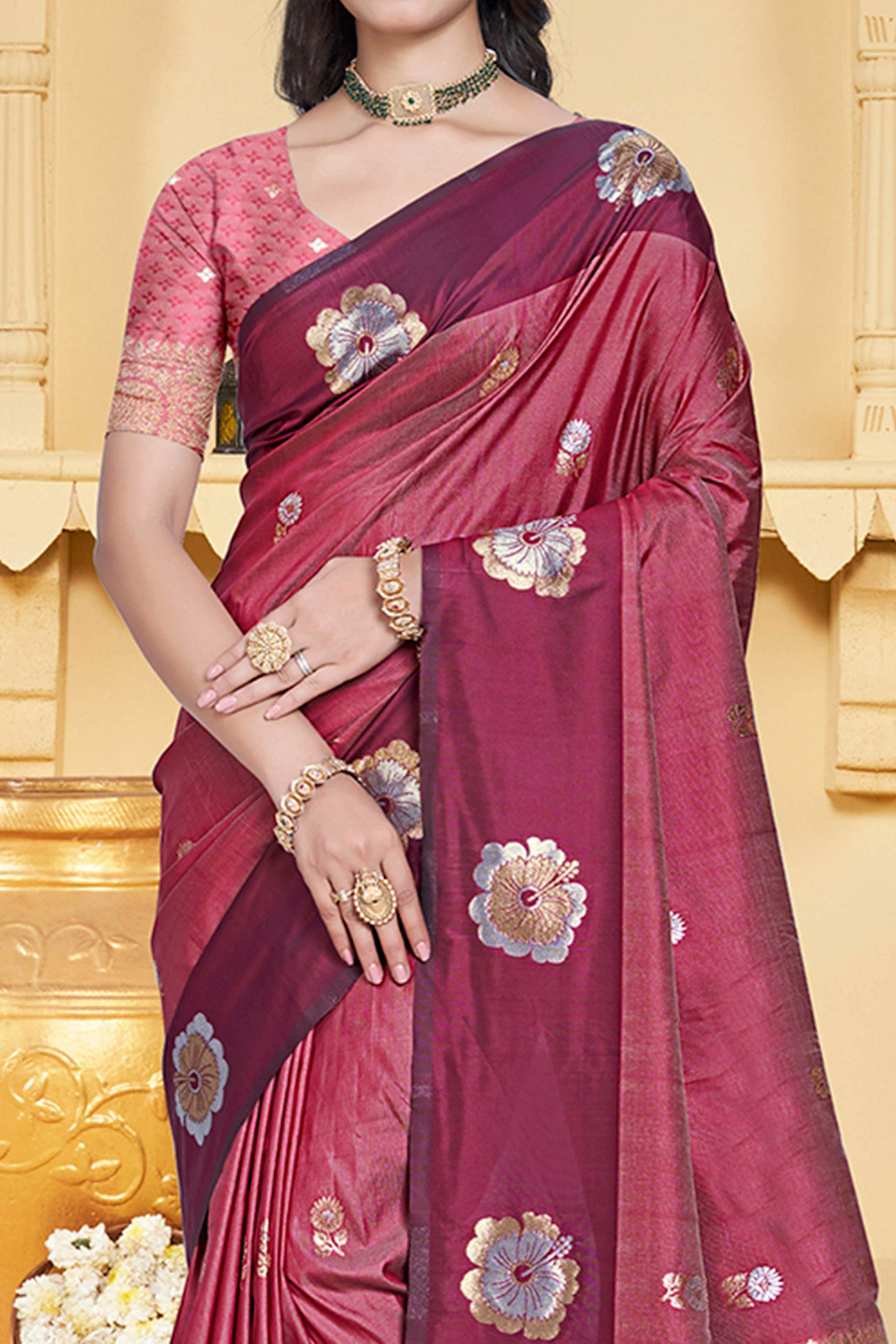 Charming Light Maroon Floral Zari Weaving Silk Blend Saree Enhanced With Stylish Tassel Pallu