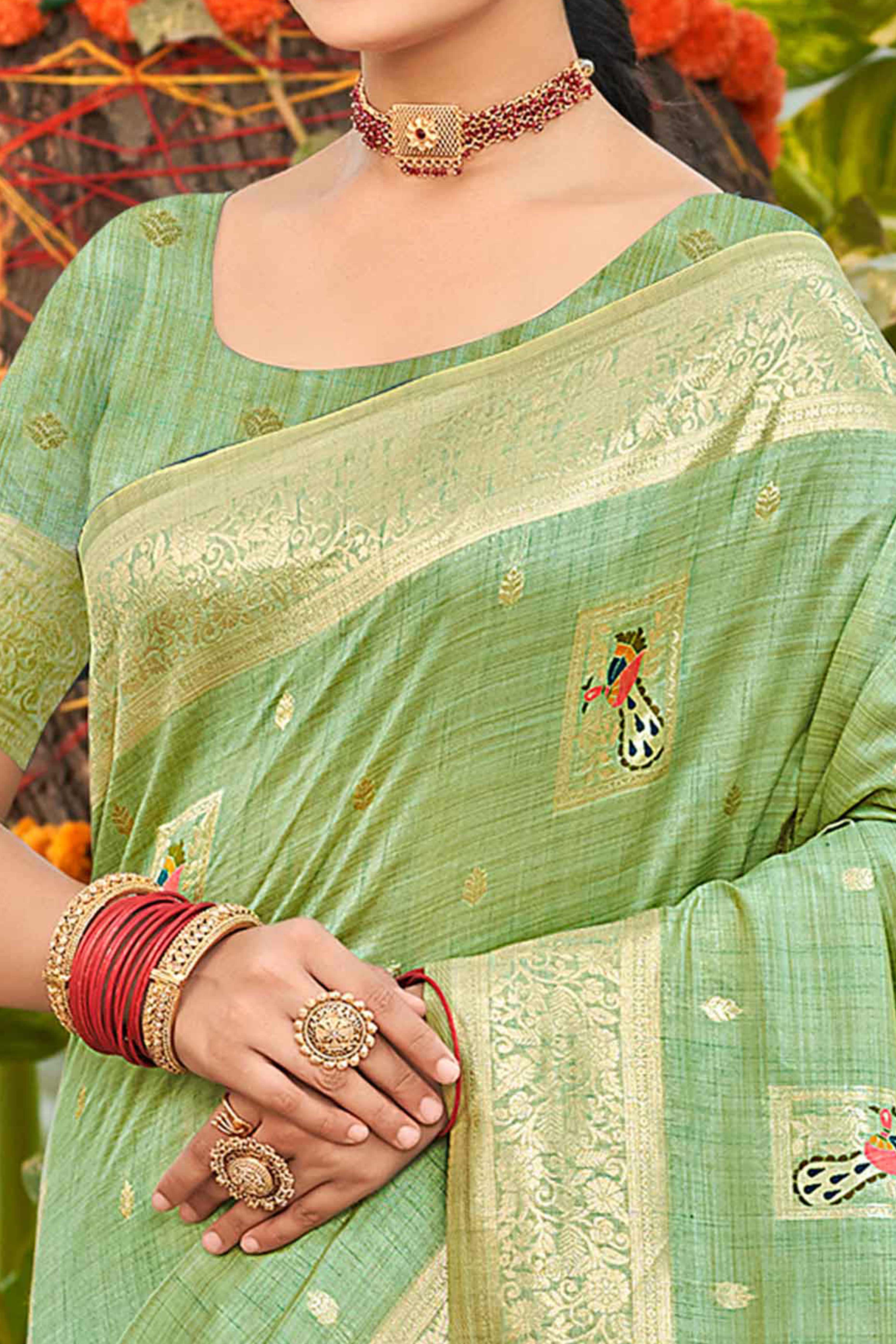 Sea Green Floral & Peacock Motif Zari Woven Assam Silk Blend Saree With Graceful Tassel Pallu