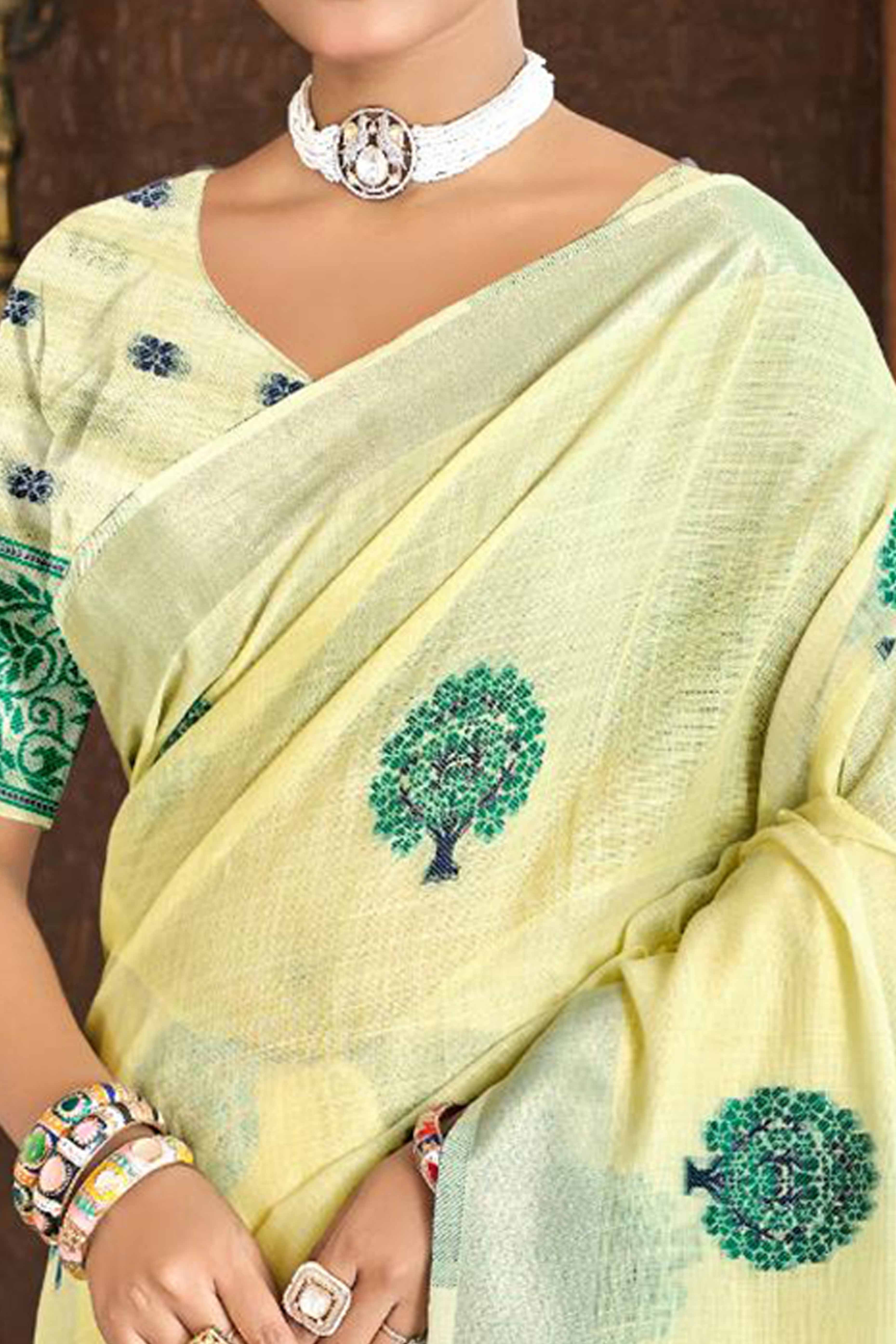 Yellow Linen Saree Adorned With Intricate Zari Weaving & Tassel Pallu